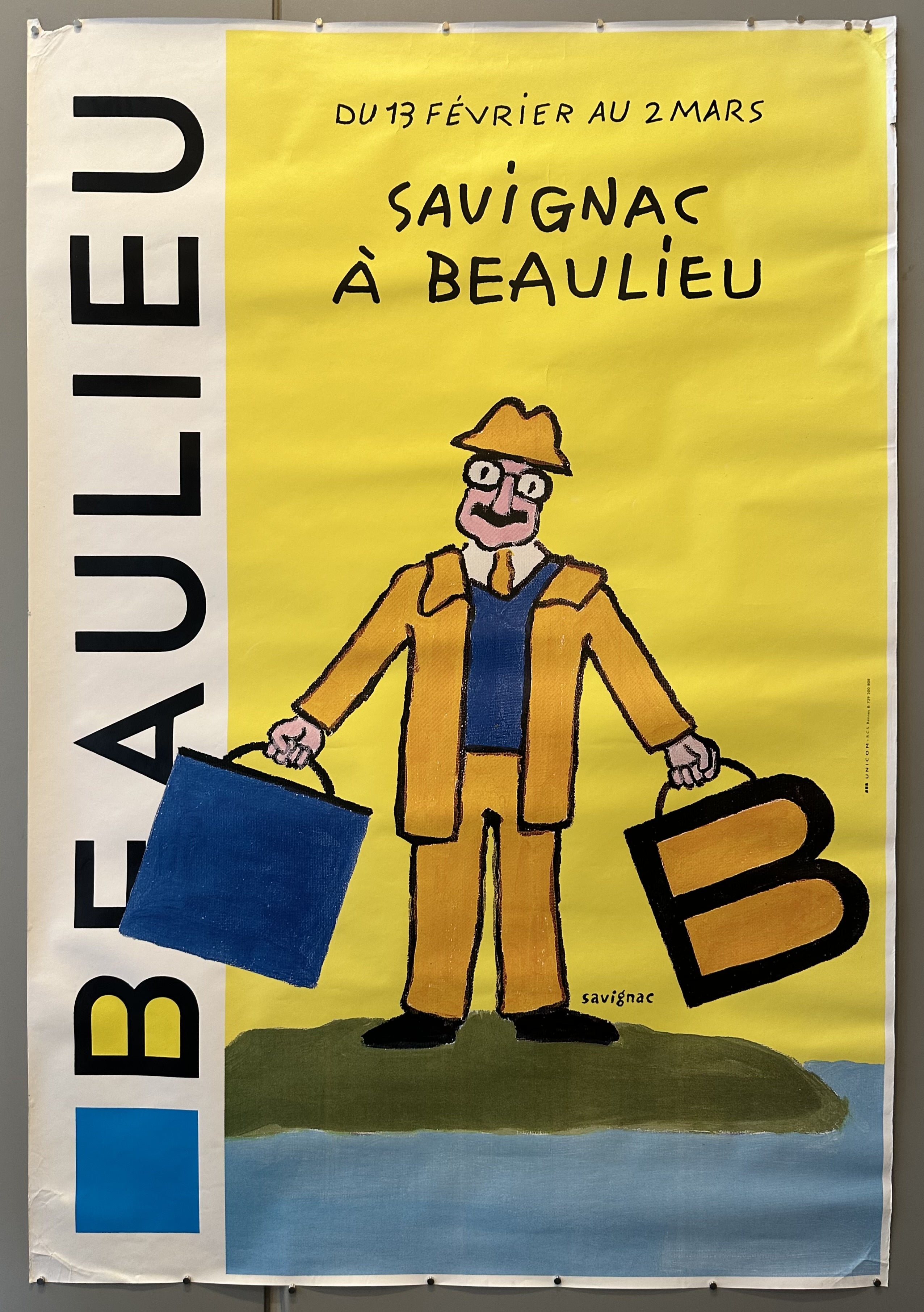 Yellow poster with man in yellow suit holding two suitcases to represent Beaulieu and Savignac's exhibition there.