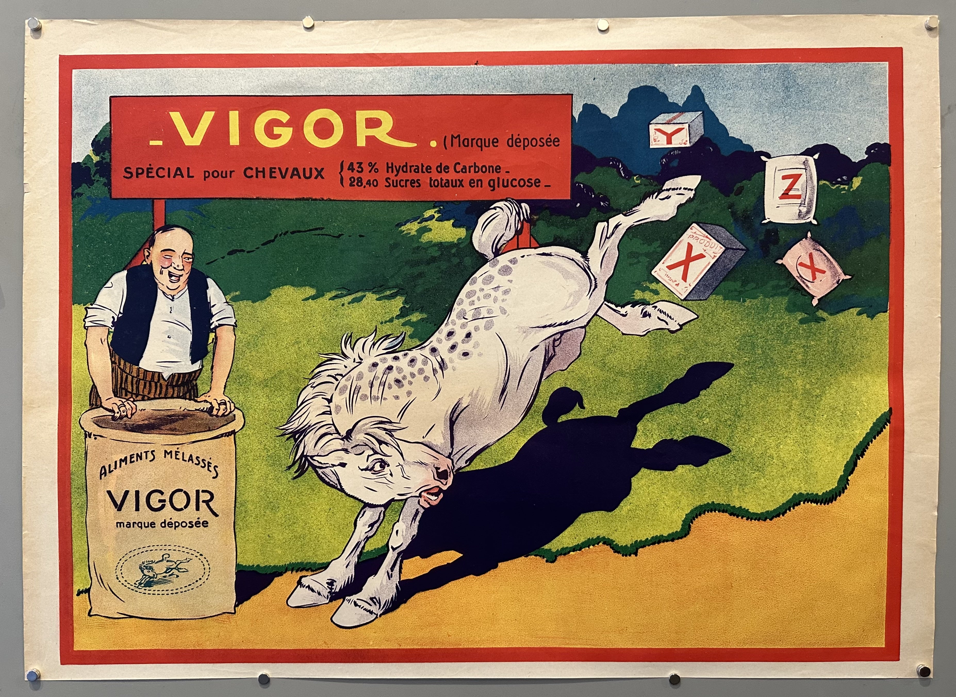 Horse rear kicks miscellaneous food products while farmer stands with a bag of Vigor in French advertisement.