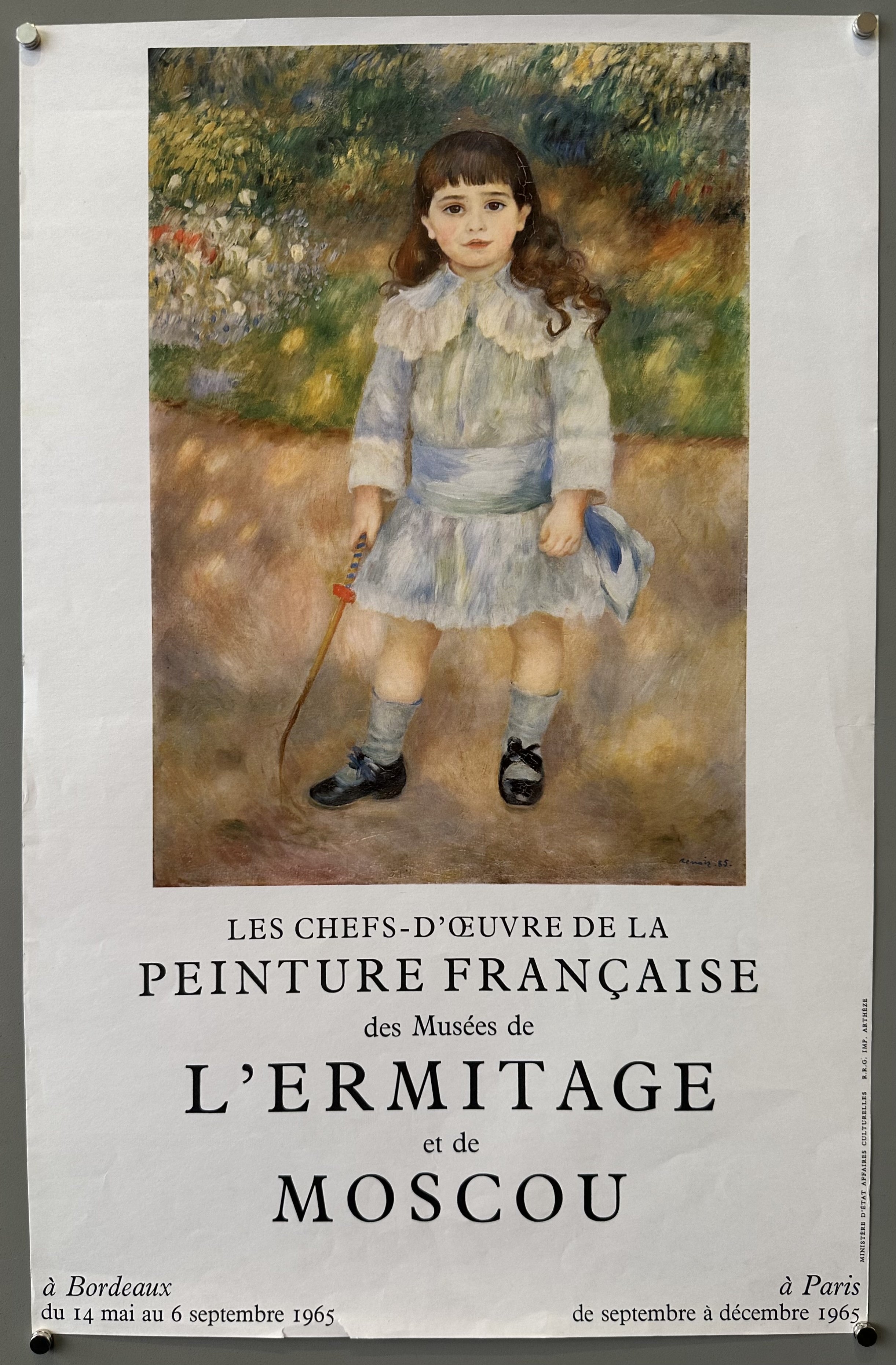 Exhibition poster with a Renoir painting as the focal point against white background with black text below.