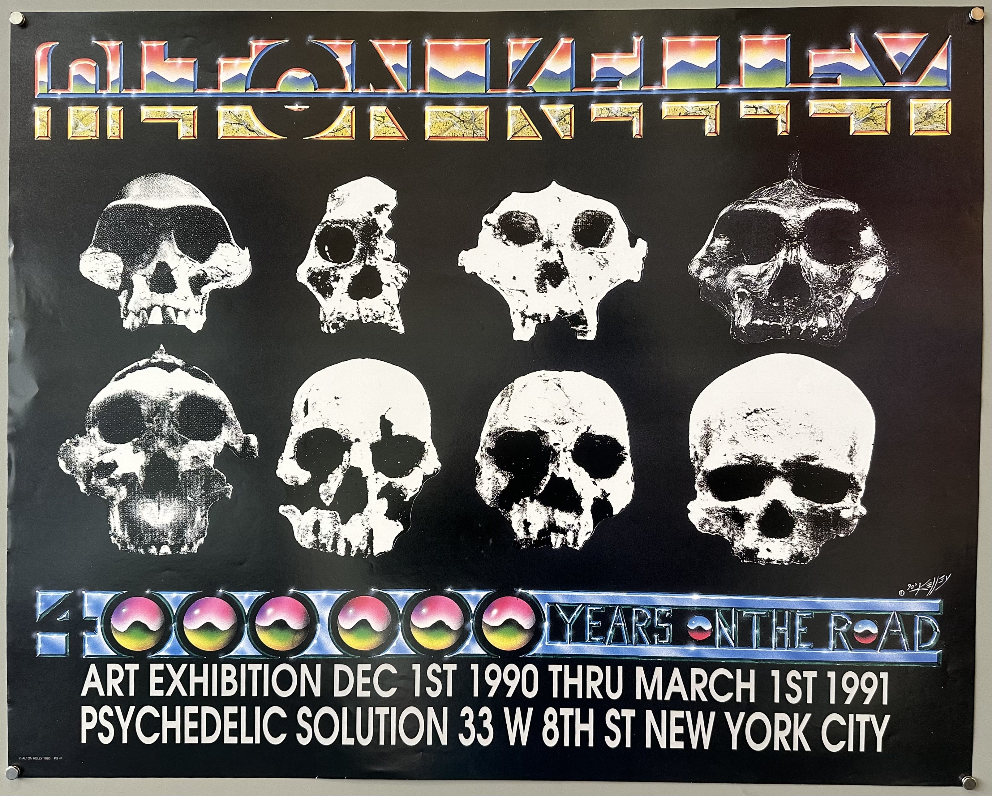 8 skulls against black background to promote artist Alton Kelley's exhibition in New York City.