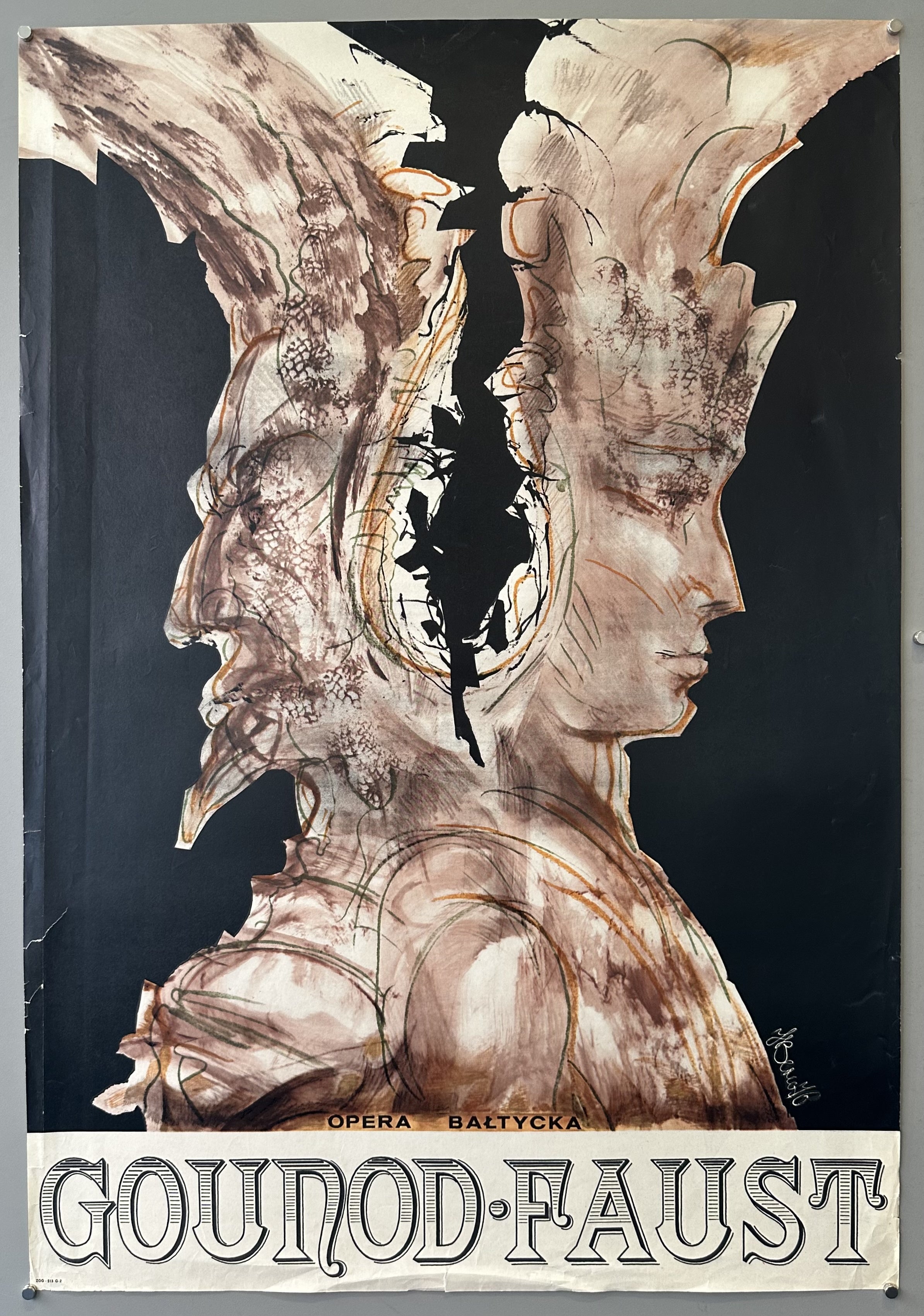 Black poster with two figures back to back to promote Gounod's opera at a Polish theater.