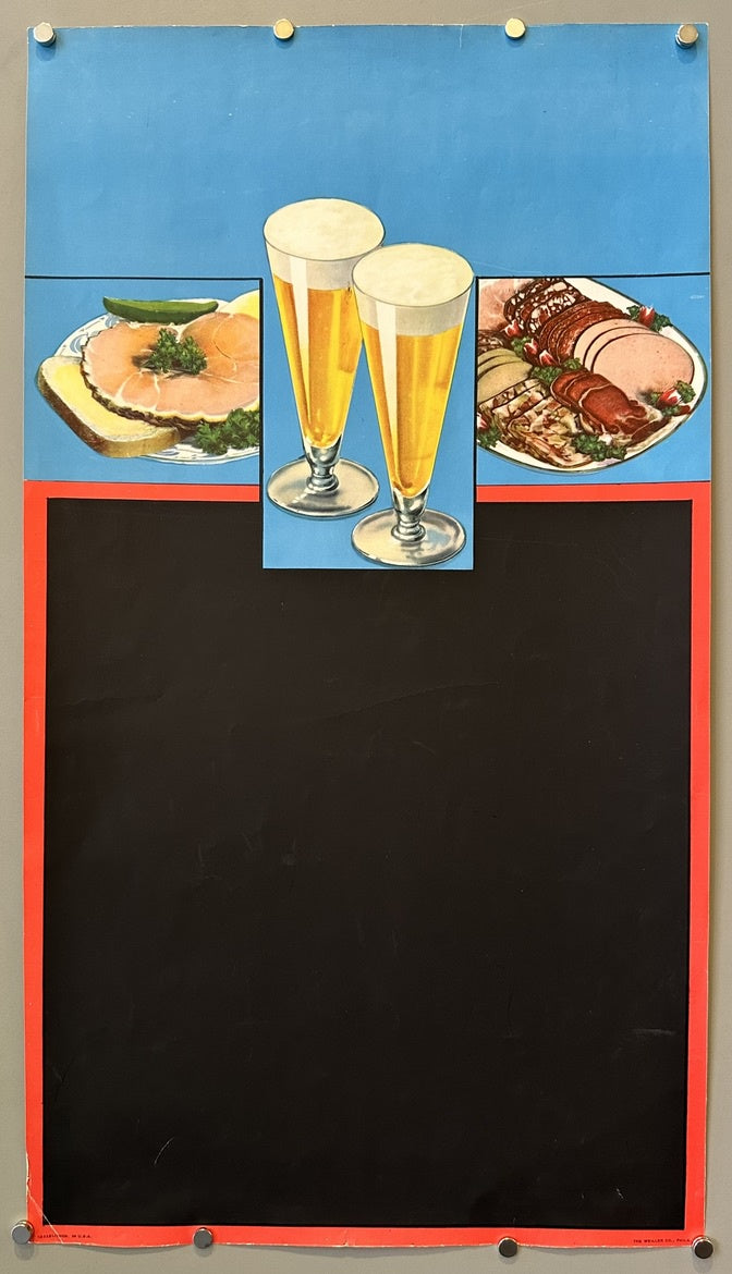A blue upper section with images of food and drink, specifically two glasses of beer, a plate of sliced meat and cheese, and a deli platter. Below this, a large black area bordered by a red frame is designed to be used as a chalkboard for writing daily specials or other menu items.