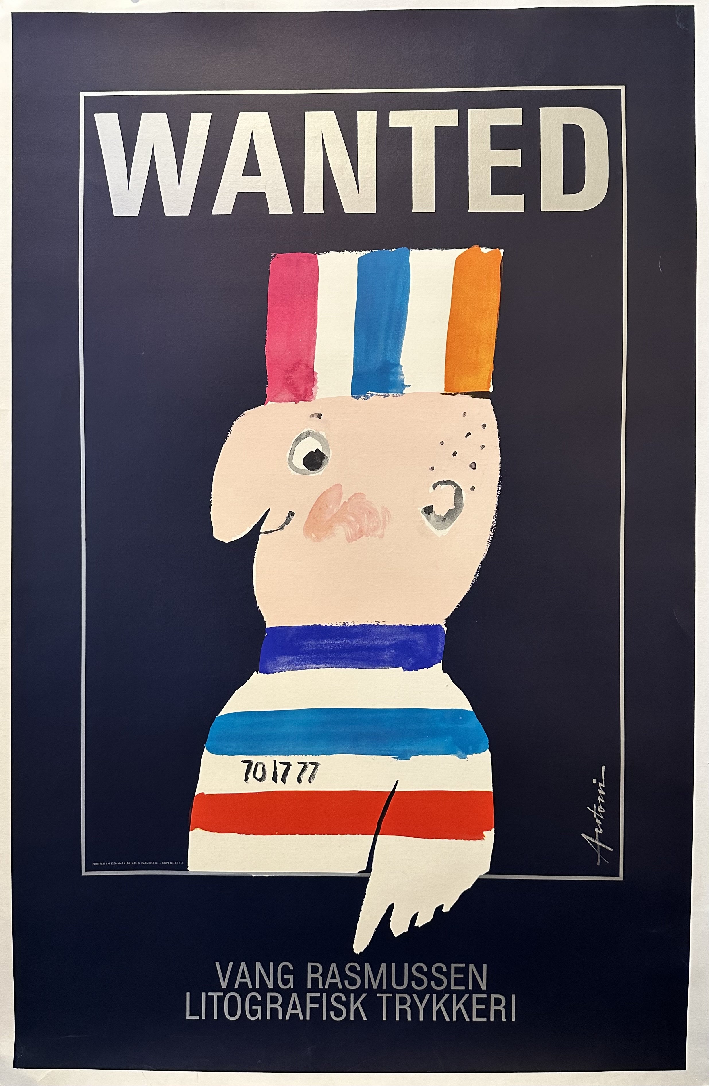 a boy with a hat and shirt striped with in varying colors. Below him it says 'VANG RASMUSSEN LITOGRAFISK TRYKKERI'