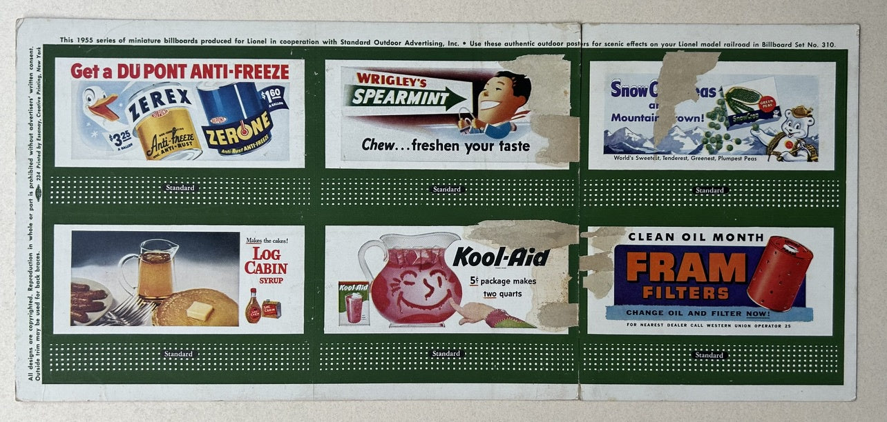 This image shows a 1955 series of miniature billboards produced for Lionel in cooperation with Standard Outdoor Advertising, Inc. The billboards feature advertisements for various products, including Zerex and Zerone anti-freeze, Wrigley's Spearmint gum, Snow Crop frozen foods, Log Cabin syrup, Kool-Aid, and Fram oil filters.