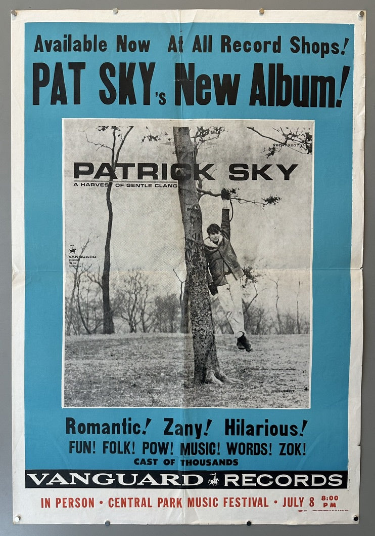 This is an advertisement poster for Patrick Sky's album "A Harvest of Gentle Clang". It features a black and white image of Patrick Sky climbing a tree, surrounded by the text "Available Now At All Record Shops!