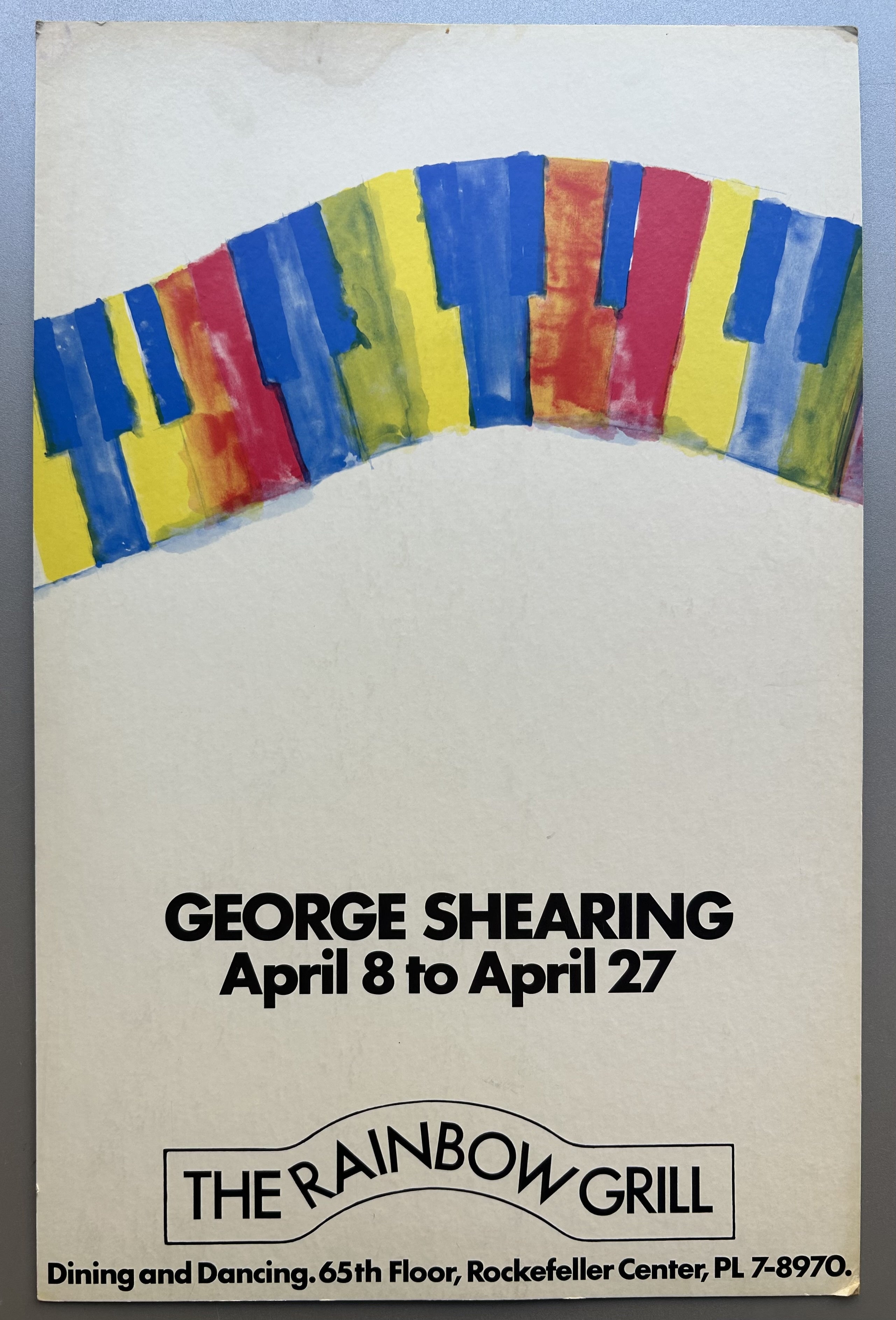 White poster with black text and rainbow piano keys running horizontally across top to promote George Shearling at Rainbow Grill.