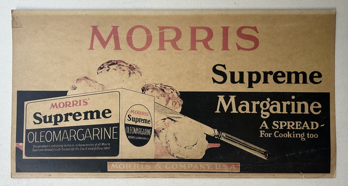 Vintage advertisement for Morris Supreme Margarine, featuring a box of Oleomargarine and a knife spreading the product on a baked potato, with text "MORRIS Supreme Margarine A SPREAD - For Cooking too" and "MORRIS & COMPANY U.S.A.".