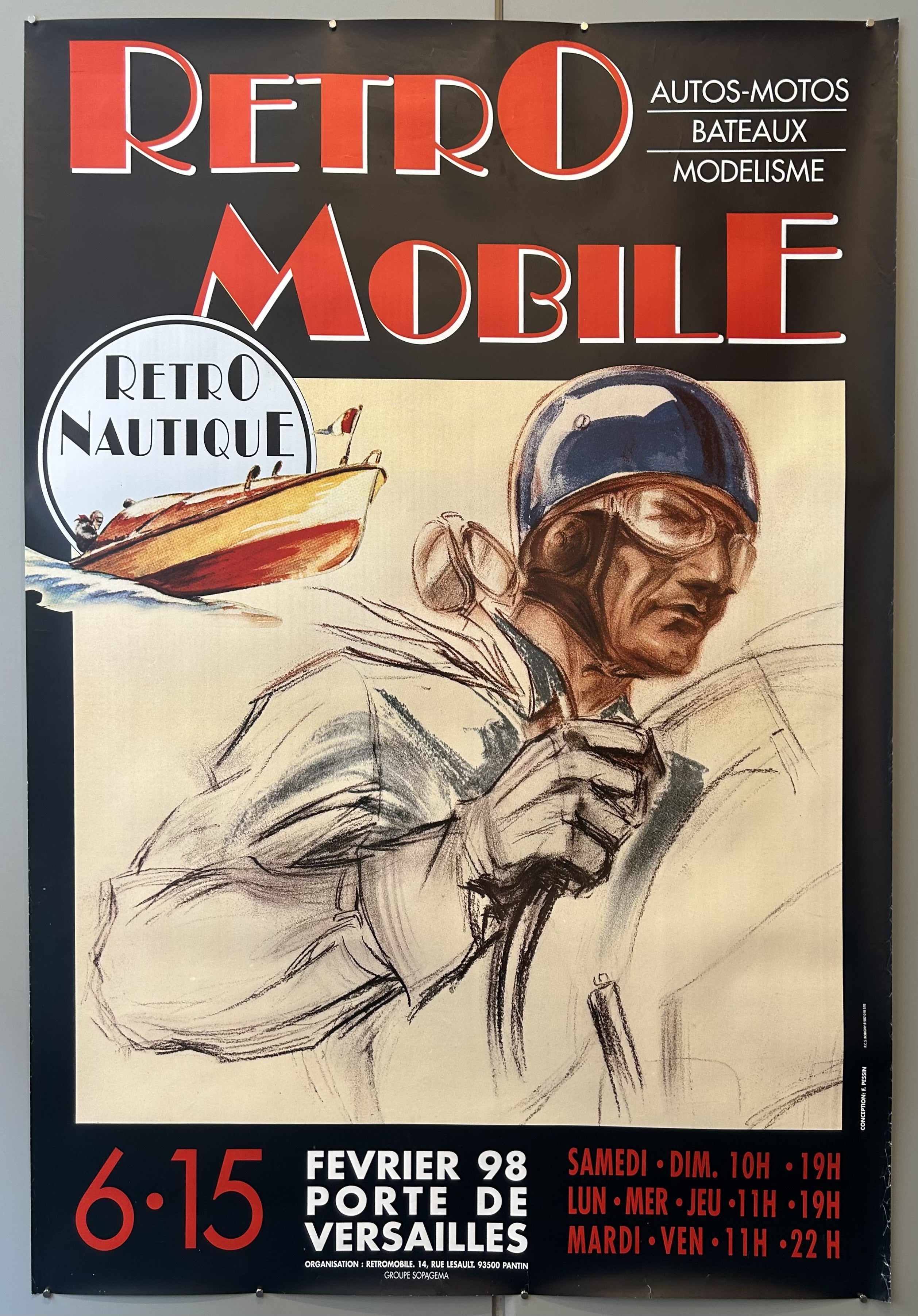 A simple sketch of a race car driver adorns this promotional poster for the 1998 show.