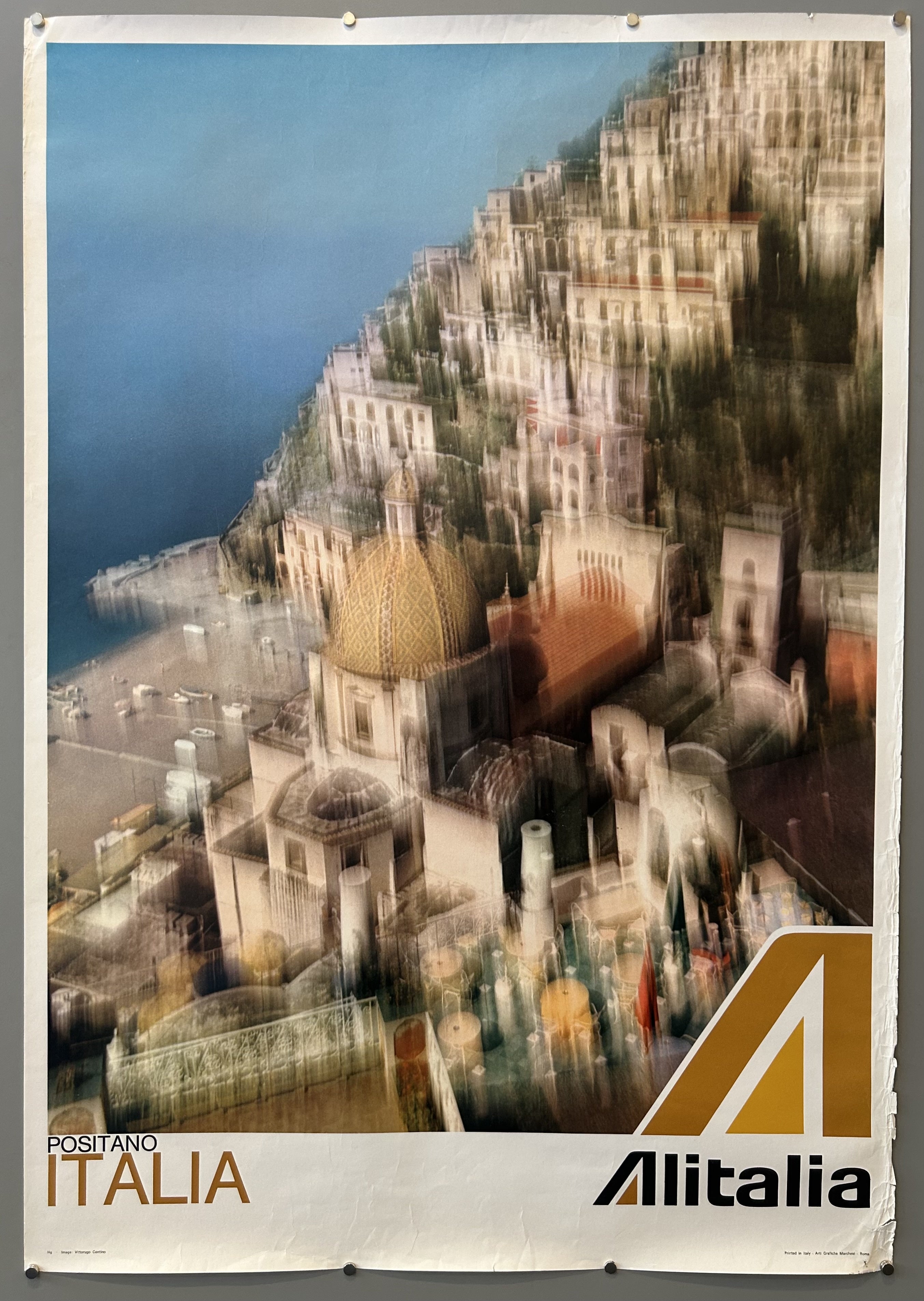 The image displays a vintage travel poster for Alitalia Airlines, promoting flights to Positano, Italy