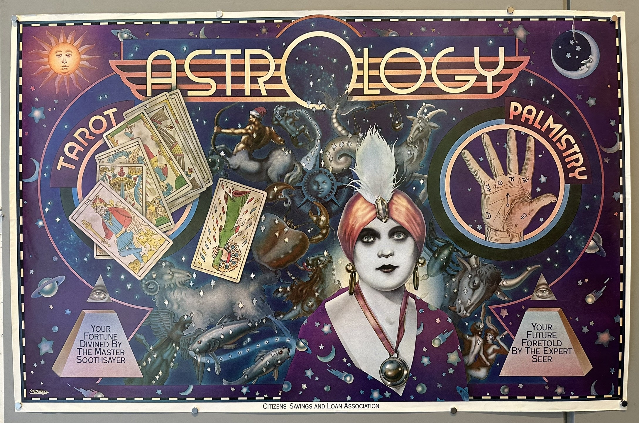 A vibrant, illustrative poster titled "ASTROLOGY" at the top center. The poster features a central figure resembling a fortune teller in a turban and ornate attire. To the left, "TAROT" is written vertically with several tarot cards depicted, and below it, text reads "YOUR FORTUNE DIVINED BY THE MASTER SOOTHSAYER."
