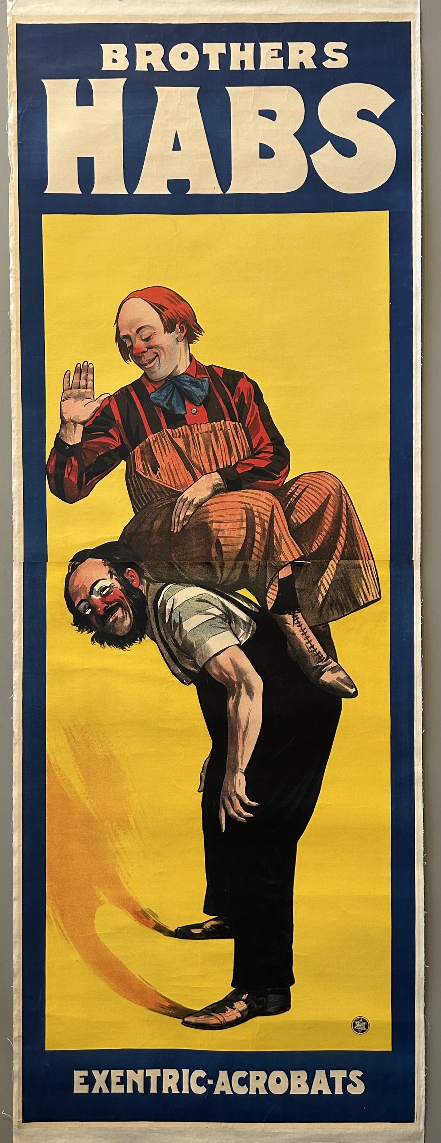 A vintage circus poster featuring "BROTHERS HABS EXENTRIC-ACROBATS." The poster depicts two male acrobats: one, dressed as a clown with a red nose and smiling face, sits on the shoulders of the other, who is bent over at the waist with a determined expression.