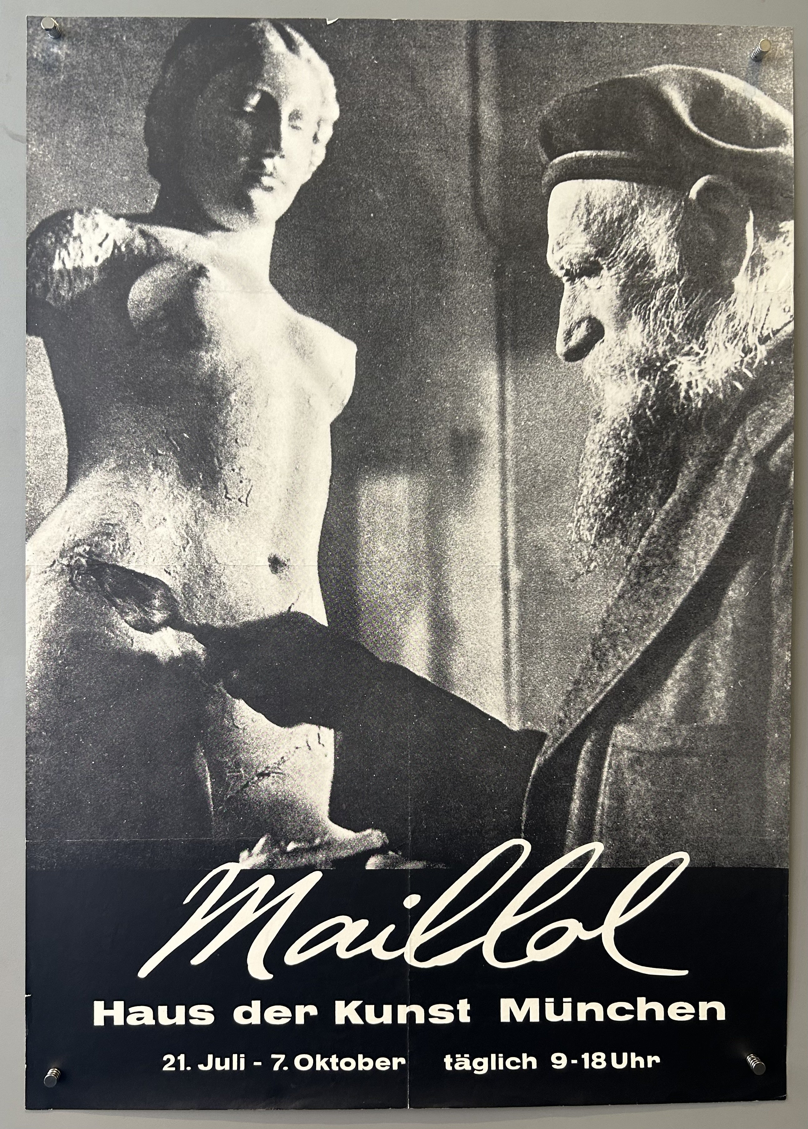 Photograph of Maillol working on a sculpture with black box and white text underneath.