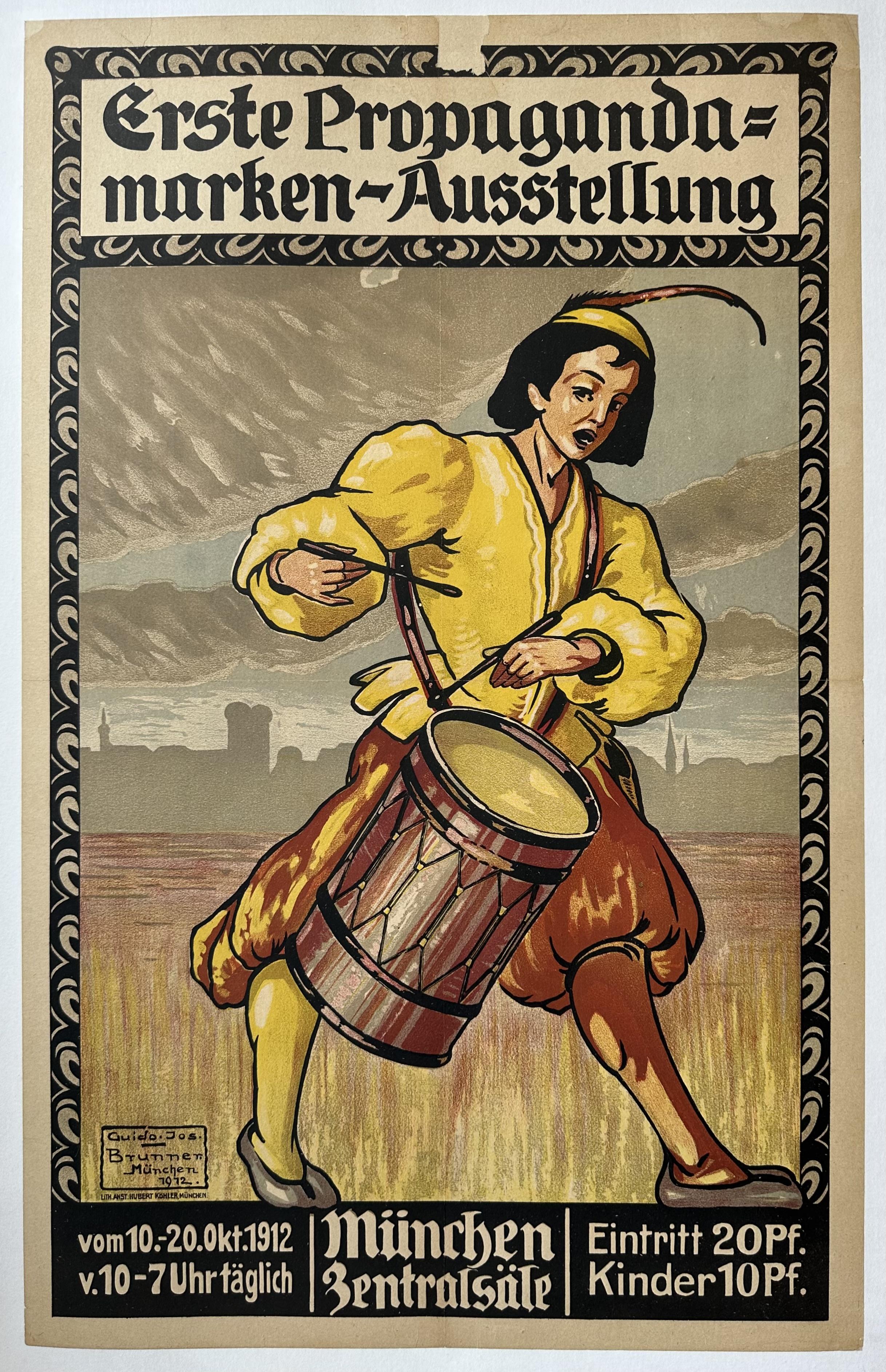 A boy plays the drums against a painted background.