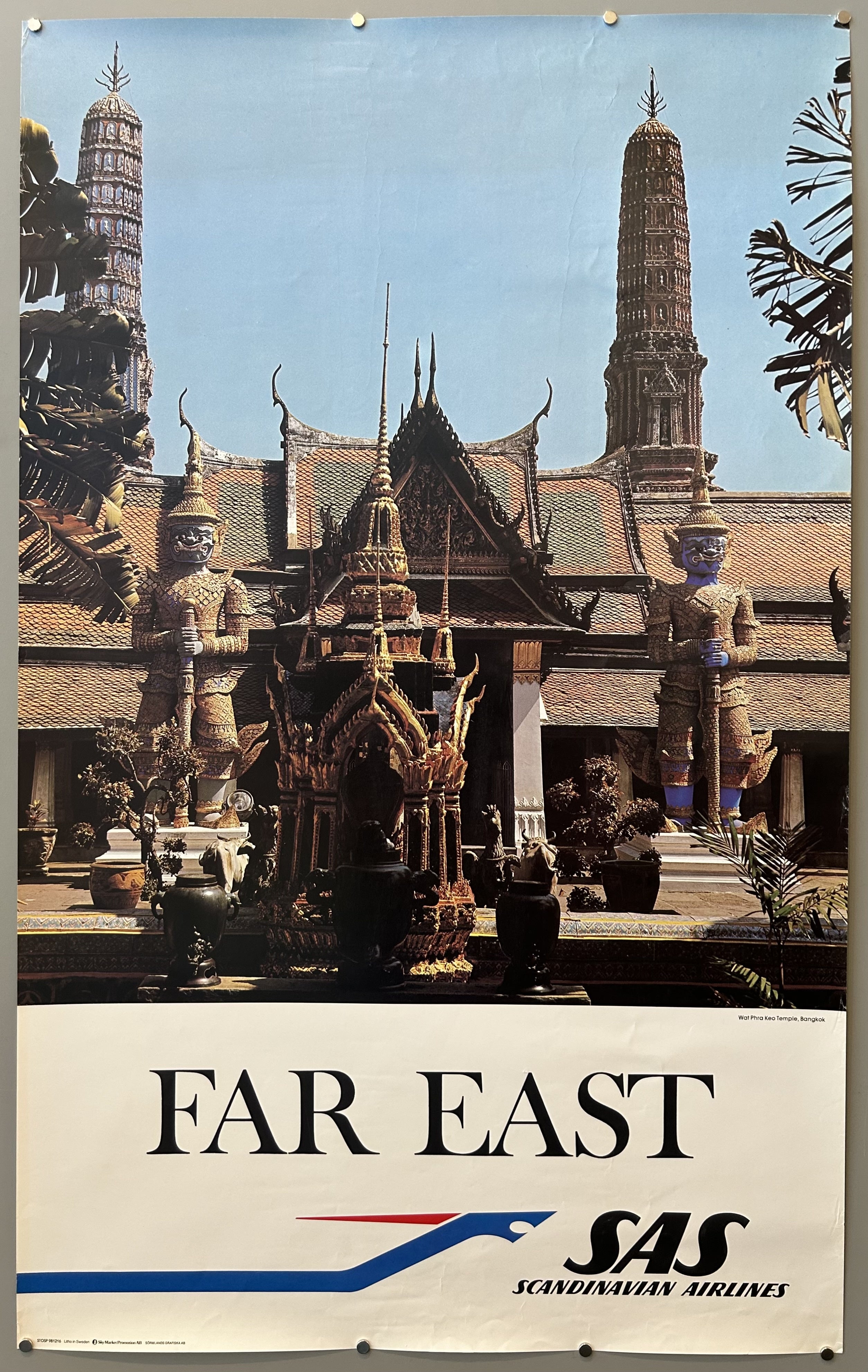 Vintage travel poster with photograph of Thai temple and white box underneath with SAS logo along bottom.