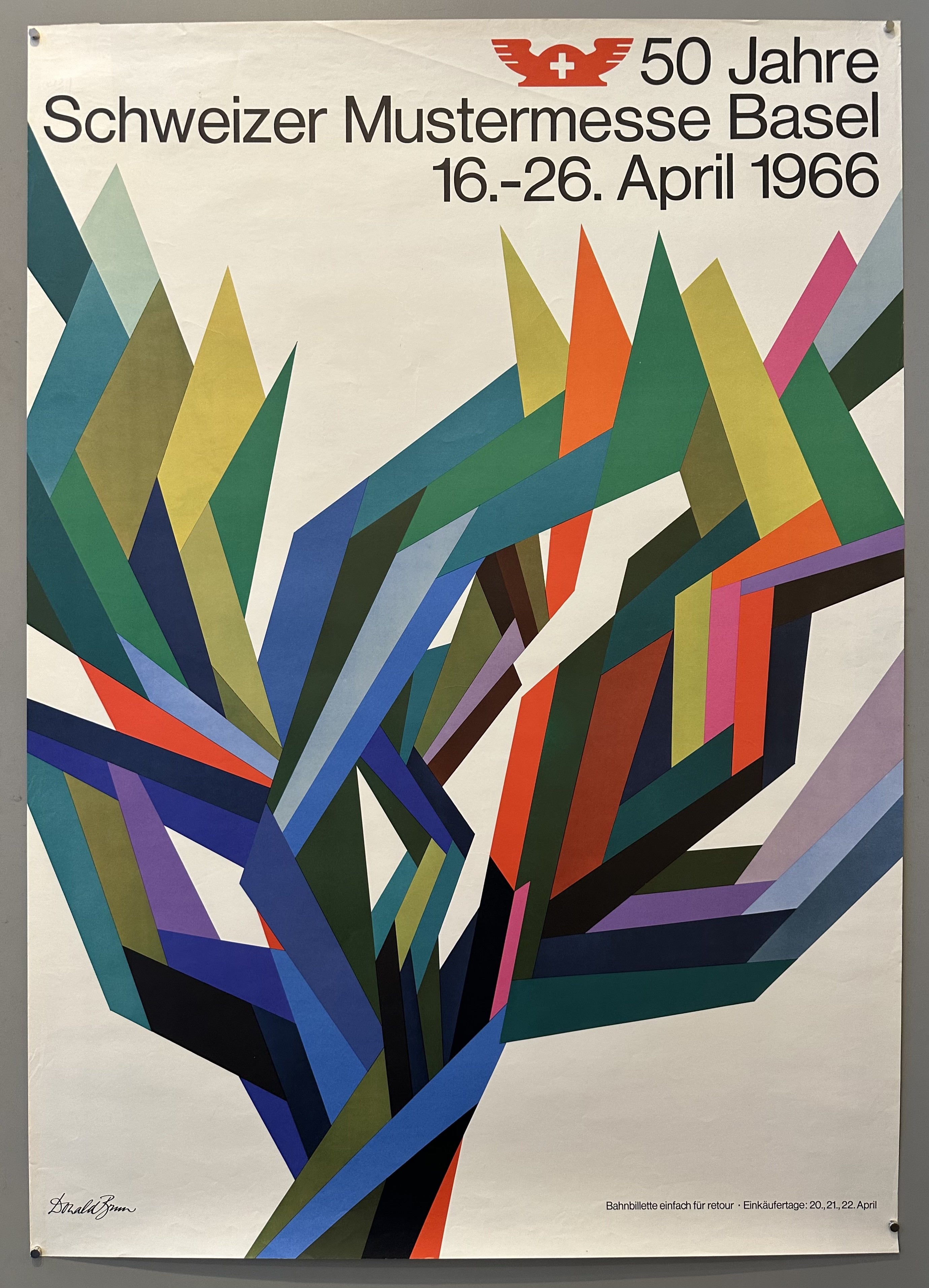 A poster celebrating 50 years of the Swiss Mustermesse Basel trade fair in 1966. It features a colorful geometric design and the text "50 Jahre Schweizer Mustermesse Basel 16.-26. April 1966".