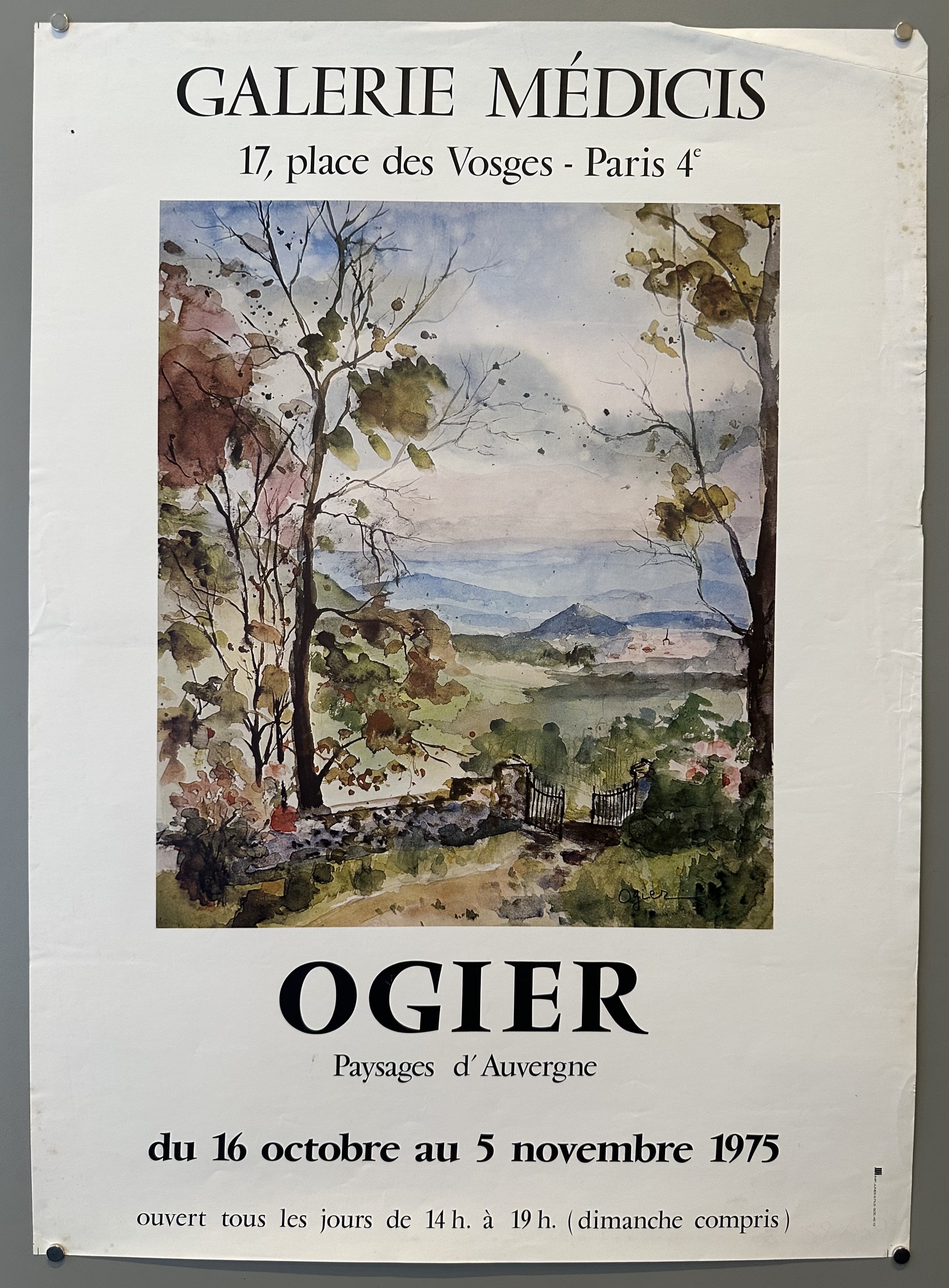 This poster advertises an art exhibition titled "OGIER: Paysages d'Auvergne" (Landscapes of Auvergne) held at Galerie Médicis in Paris in 1975.