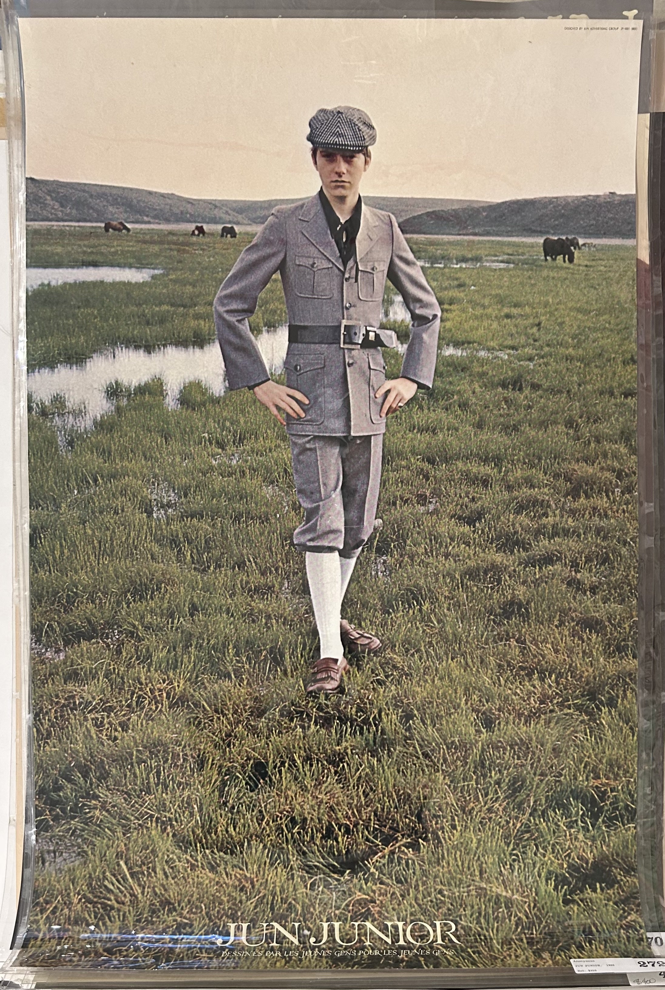 boy standing in grass