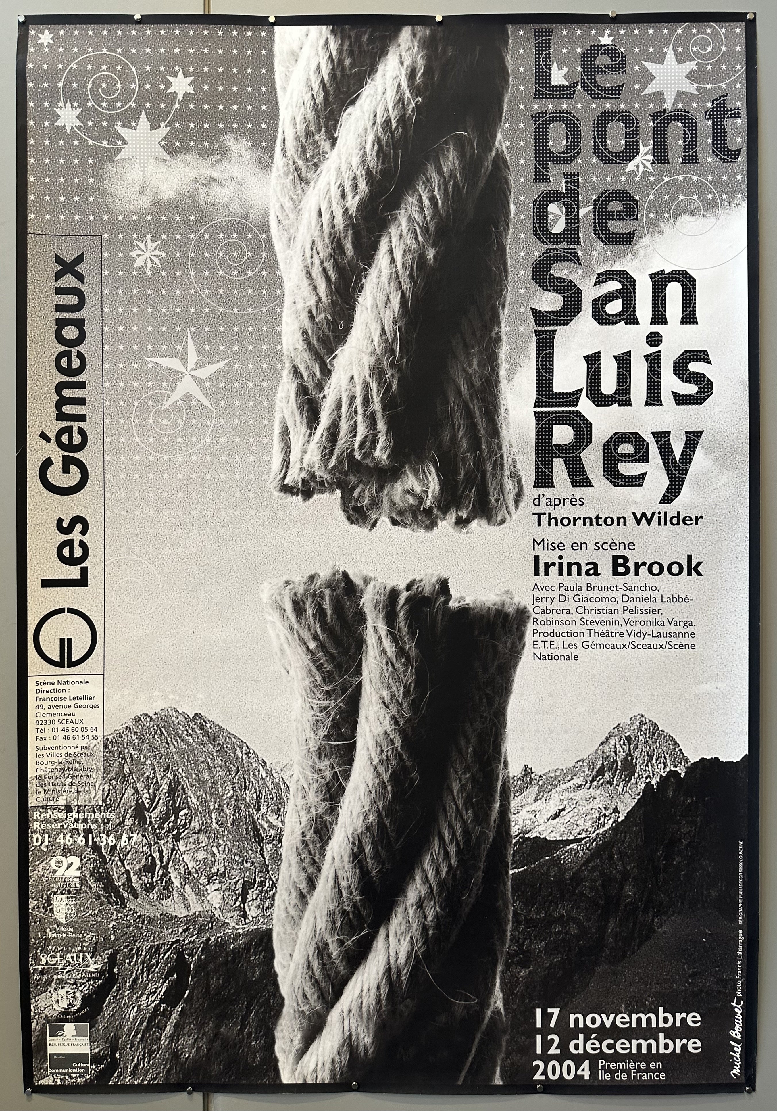Black and white poster of a frayed rope overlaid on a photo of mountains for a play at the Les Gemeaux in France.