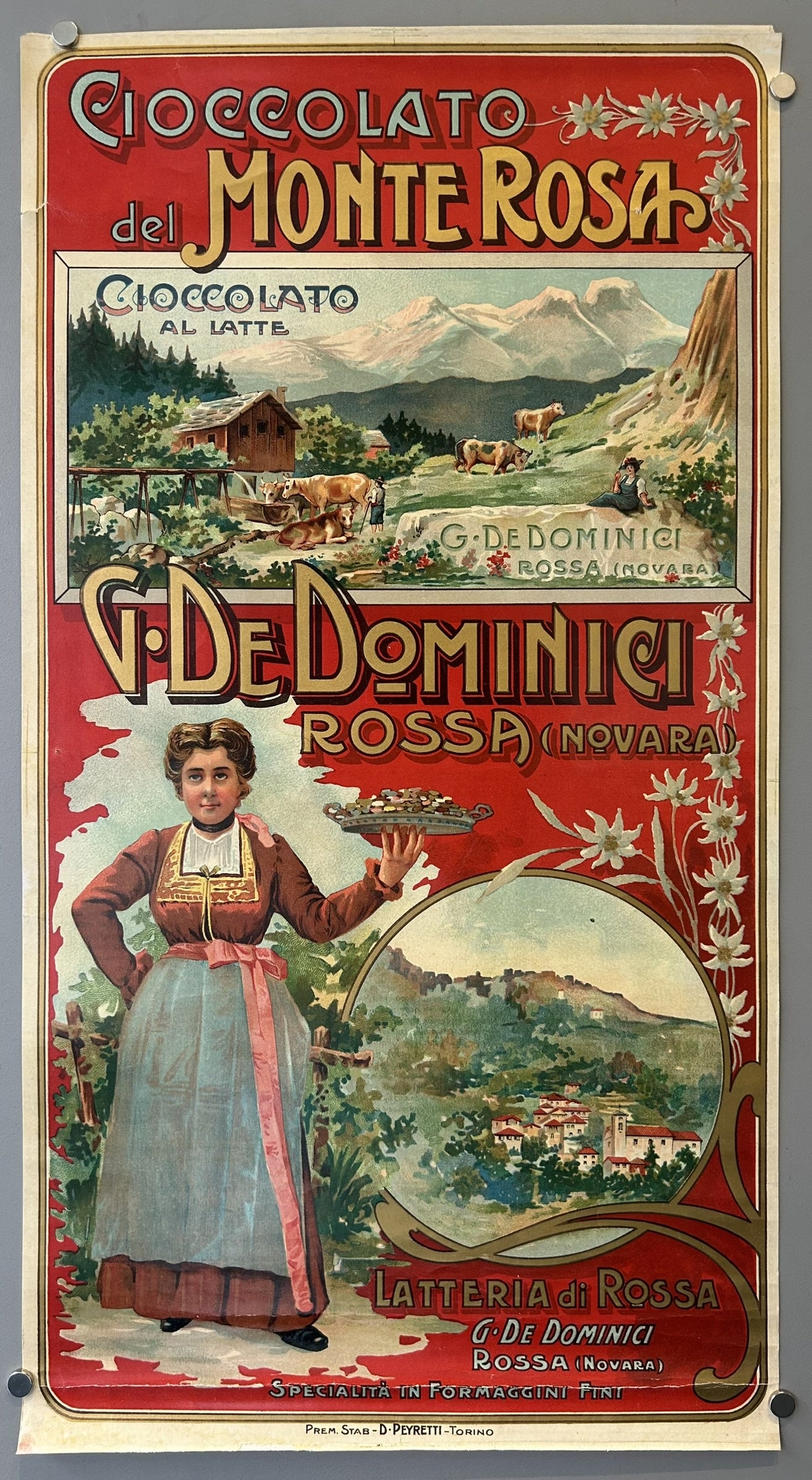 Poster for cioccolato del Monte Rosa Chocolate. Red background, woman holding a plate of chocolates, lanscape in the background.