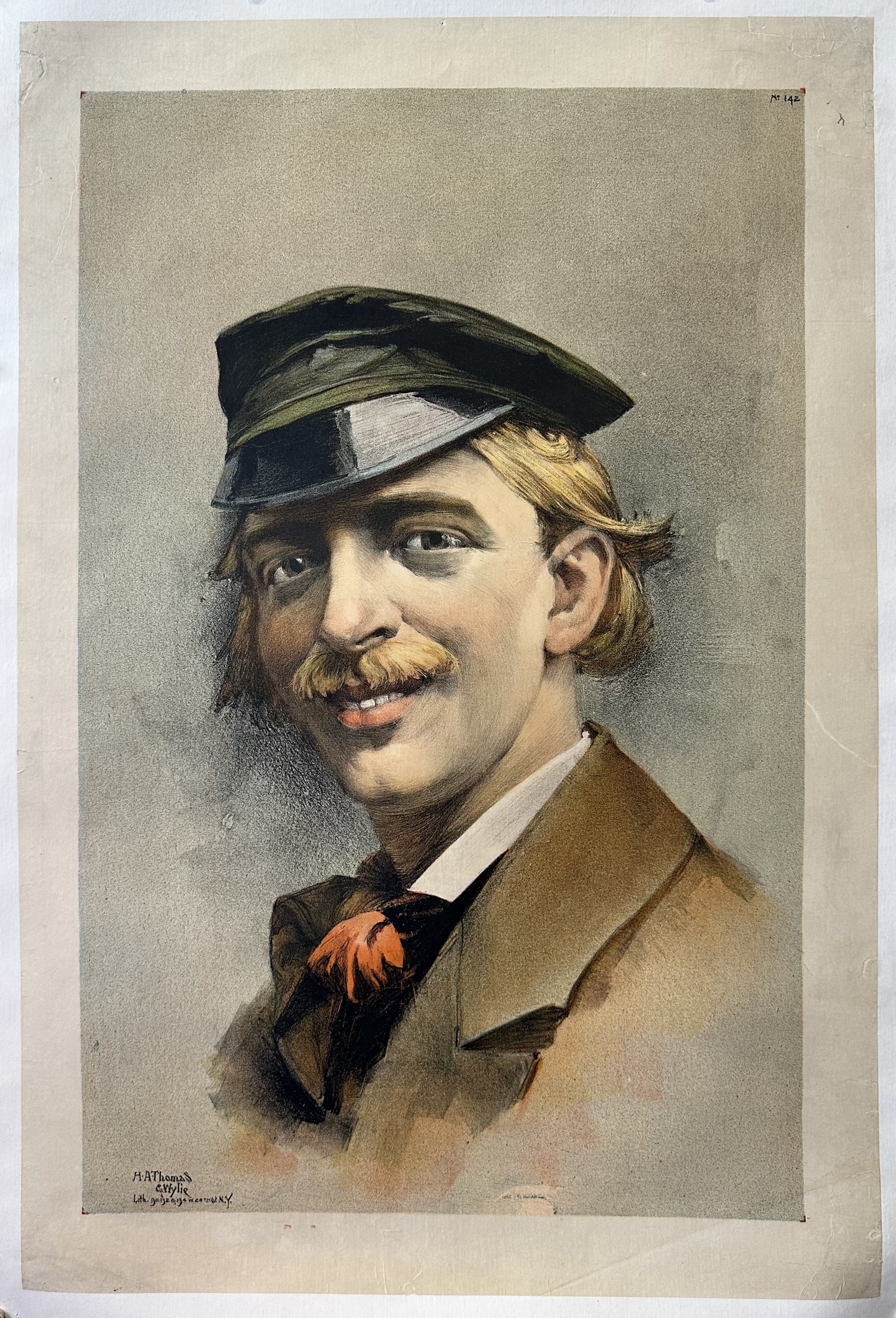 A smiling blonde man with a mustache