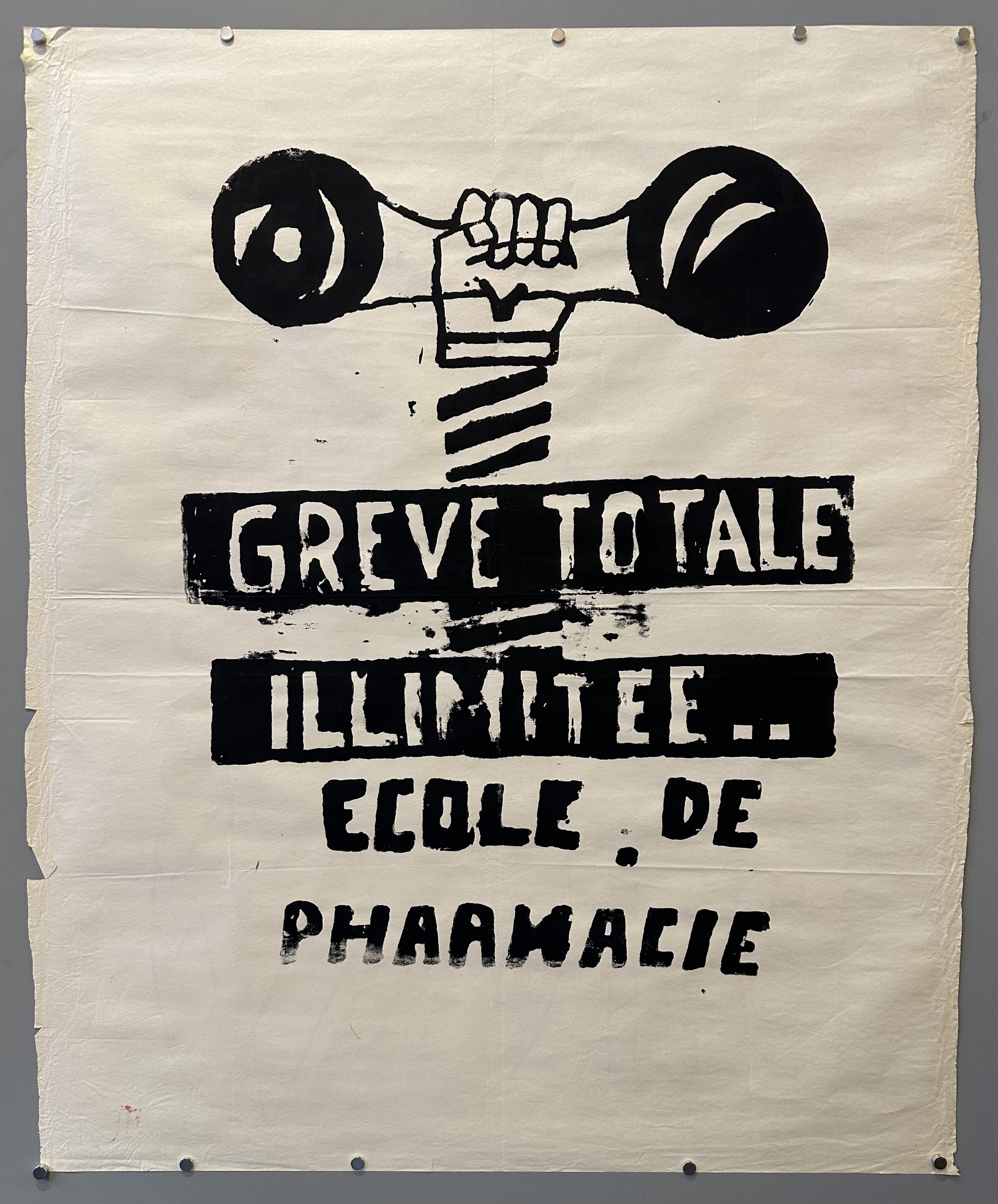 A hand holds a barbell as it lifts over text encouraging French pharmacy students to join the May 68 protests.