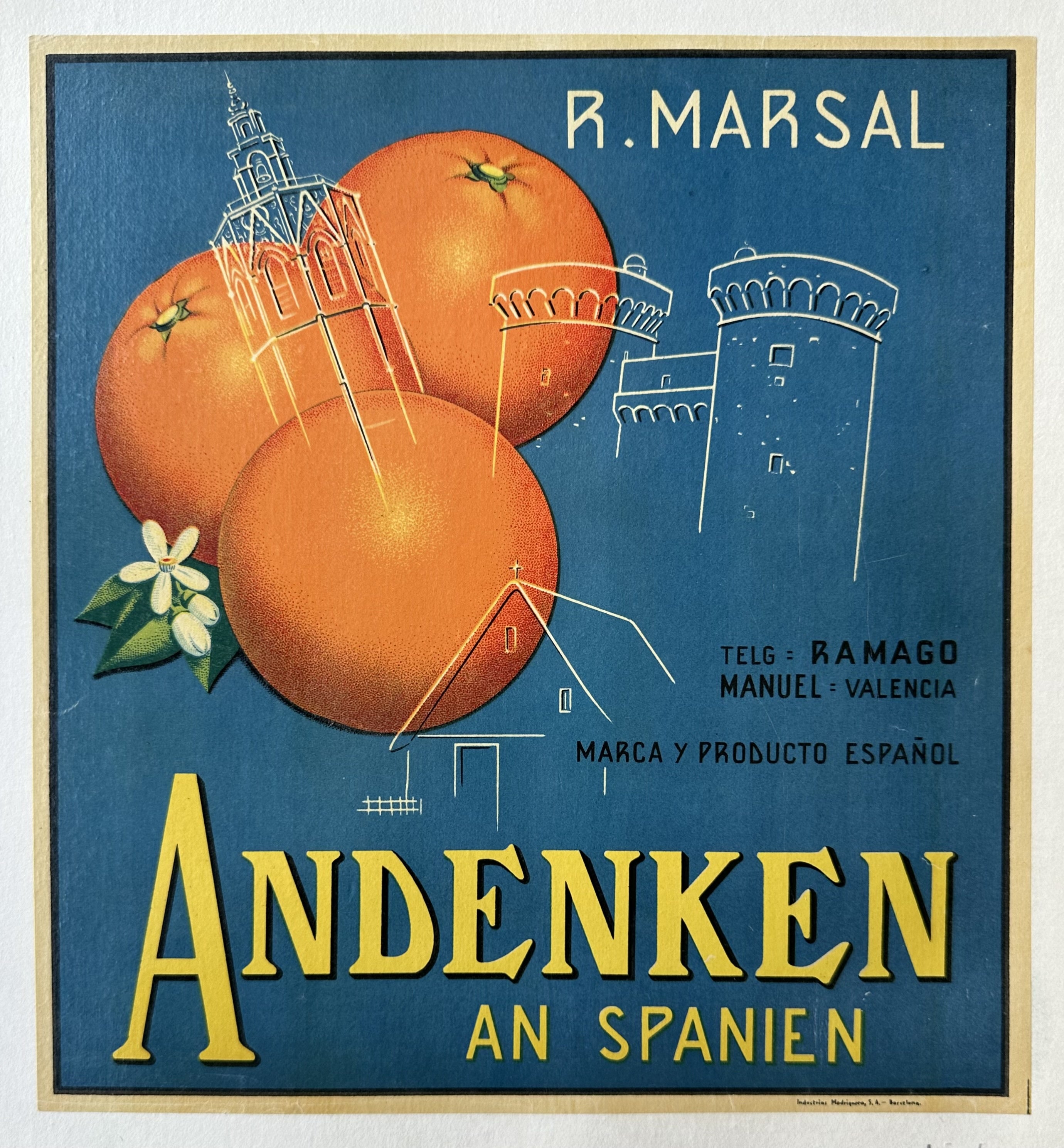 A vintage orange crate lable with a spanish theme, featuring three oranges at the top and a spanish-style building at the center