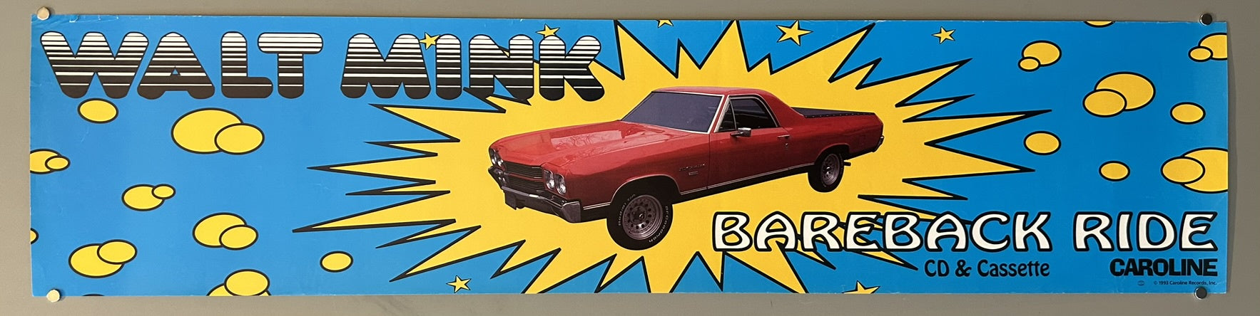 A horizontal banner advertisement for the Walt Mink album "Bareback Ride," featuring a red 1970s Chevrolet El Camino surrounded by a yellow starburst on a blue background with yellow circles and stars. Text at the top reads "WALT MINK" and at the bottom right, "BAREBACK RIDE CD & Cassette CAROLINE."