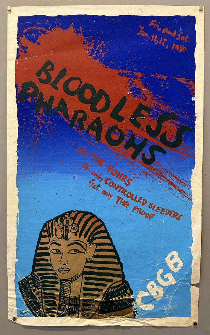 "Bloodless Pharaohs" at CBGB, featuring a pharaoh's head illustration. The poster is predominantly red and blue with black text and splashes of red paint-like elements.