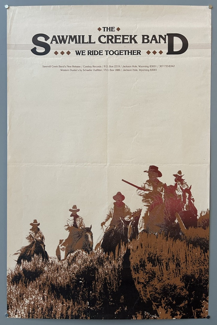 A vintage poster for "THE SAWMILL CREEK BAND" with the tagline "WE RIDE TOGETHER." The bottom portion features an illustration of several cowboys on horseback riding through a rugged, arid landscape.