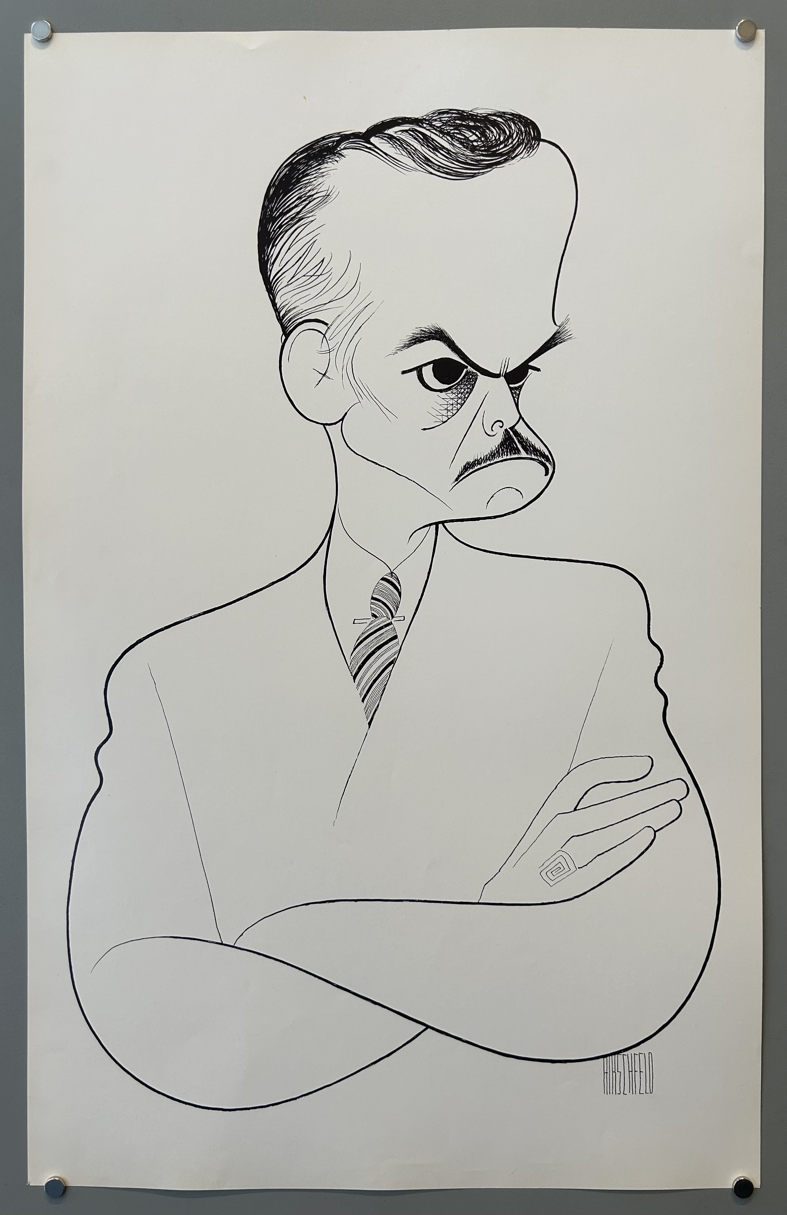 man is gloomy and crosses his arms