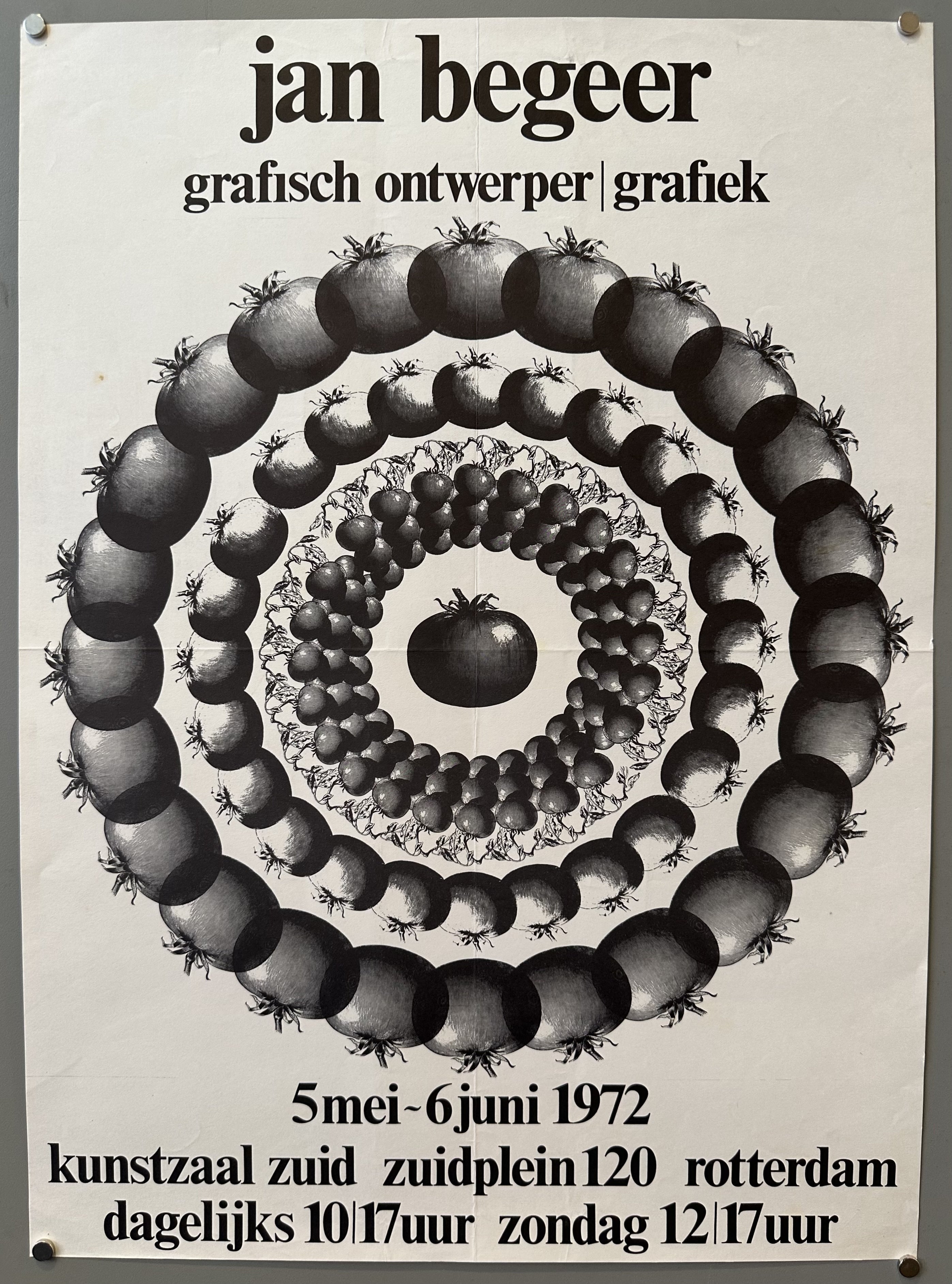 White poster with black text and black and white repeating tomato graphic.