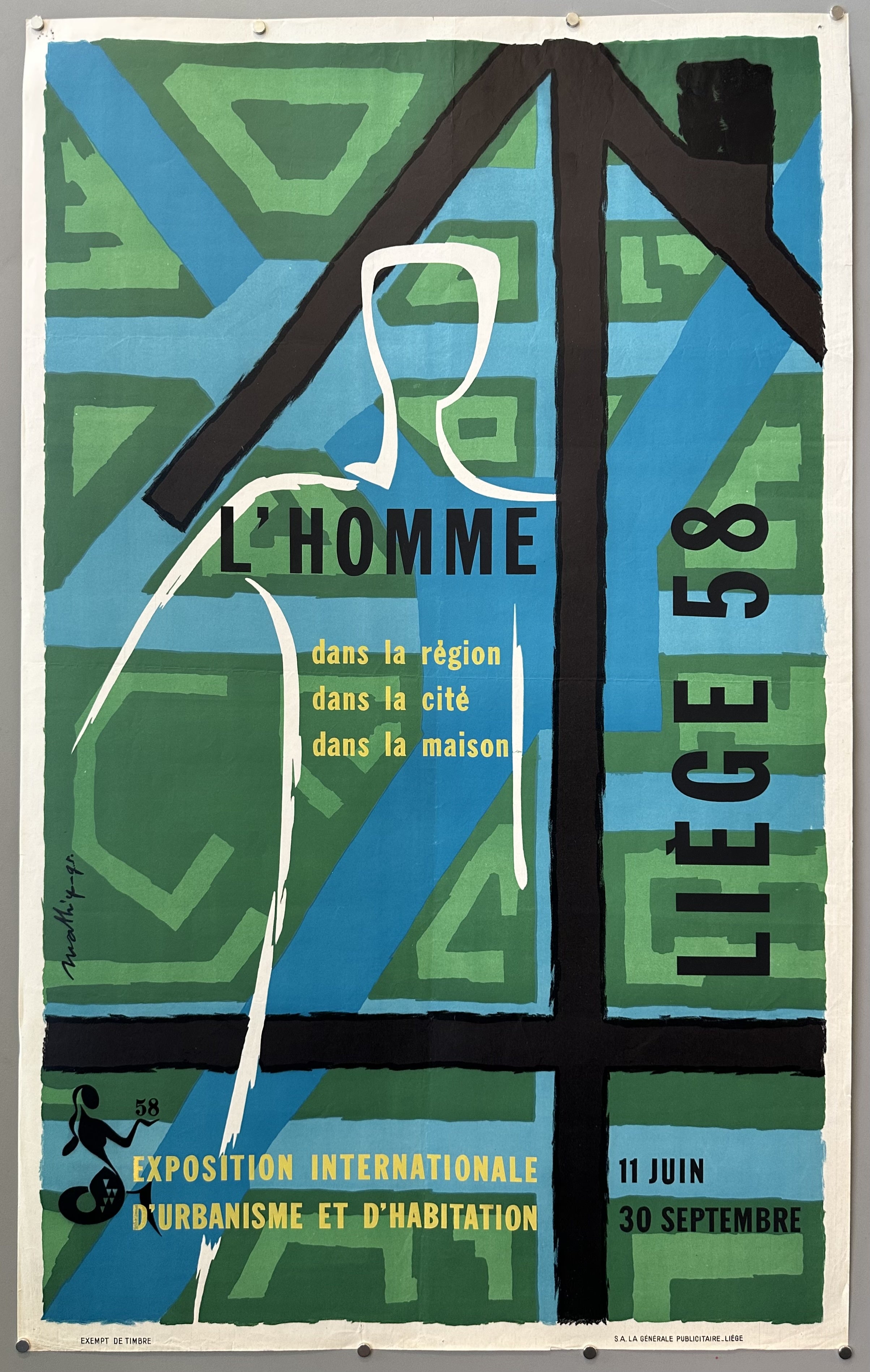 The text on the poster is in French, which is one of the official languages of Belgium, particularly in the Wallonia region where Liège is situated.