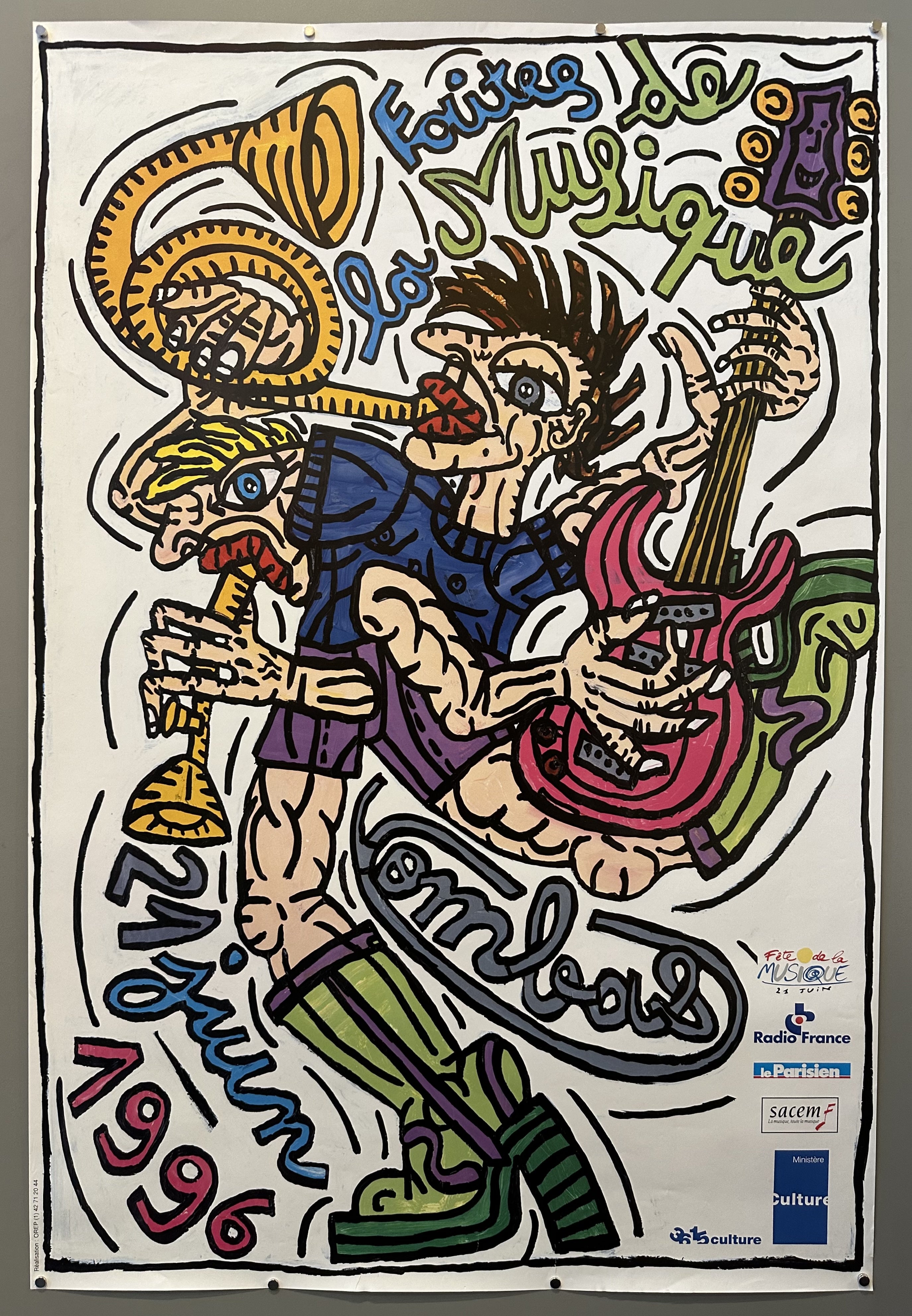 Two musicians play a variety of instruments in this poster promoting the 1996 French music festival.
