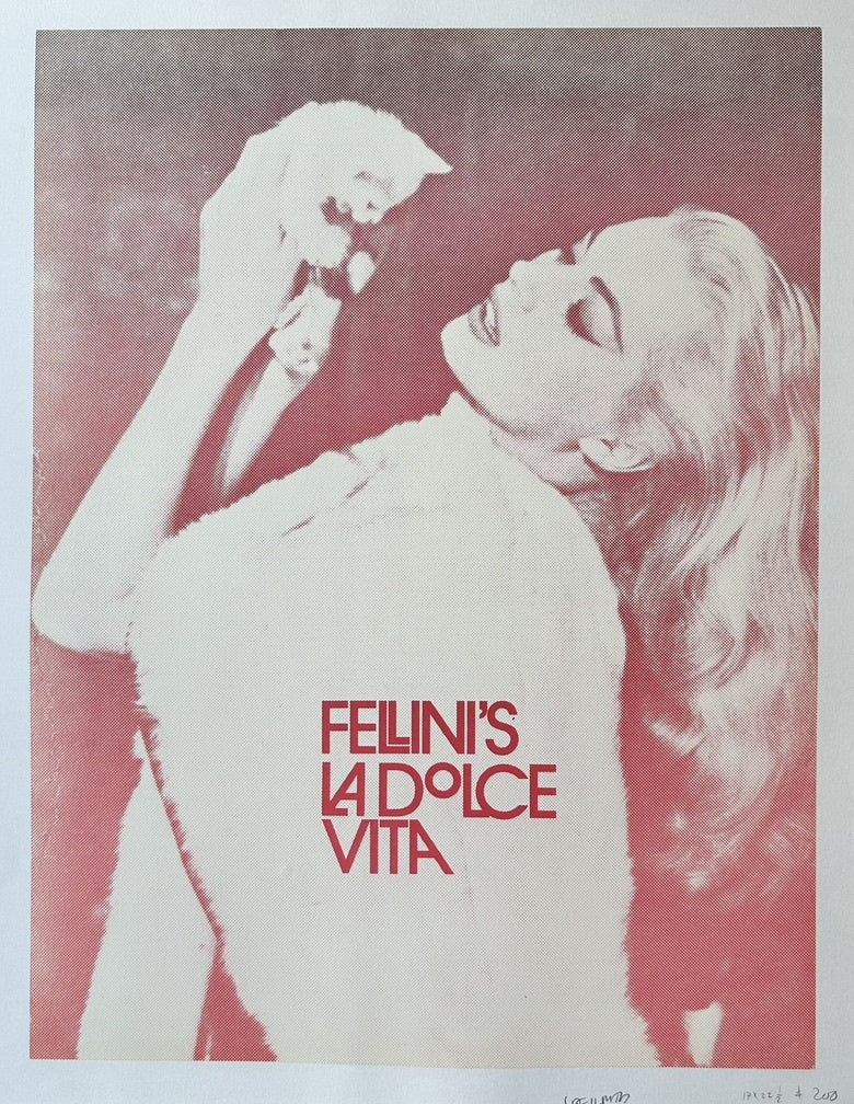 Pink and white poster featuring a woman in a fur stole with text reading "FELLINI'S LA DOLCE VITA".