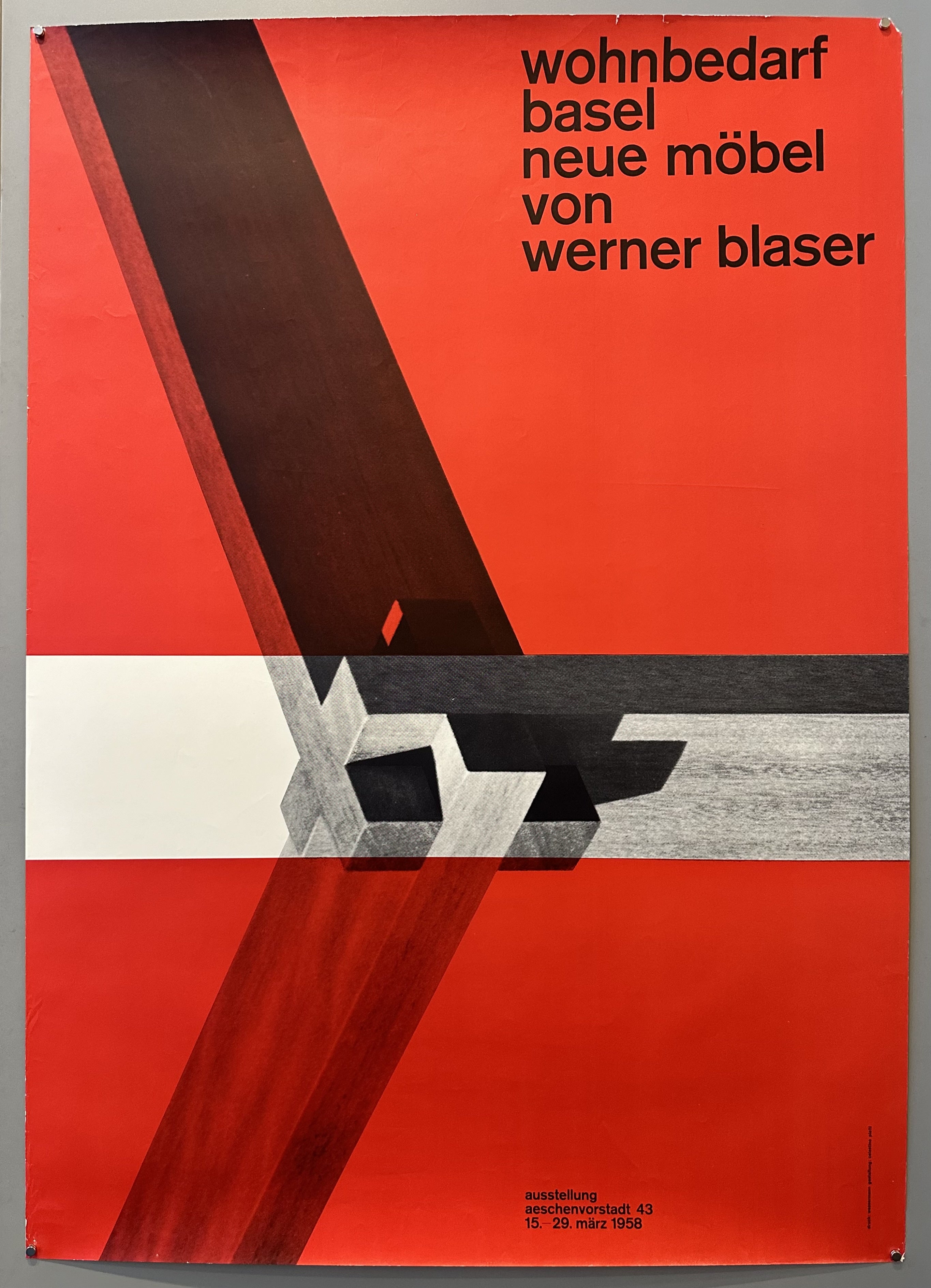 A vintage poster advertising an exhibition of new furniture designed by Werner Blaser in Basel, Switzerland in 1958. The poster features a bold geometric design in red, black, and white.