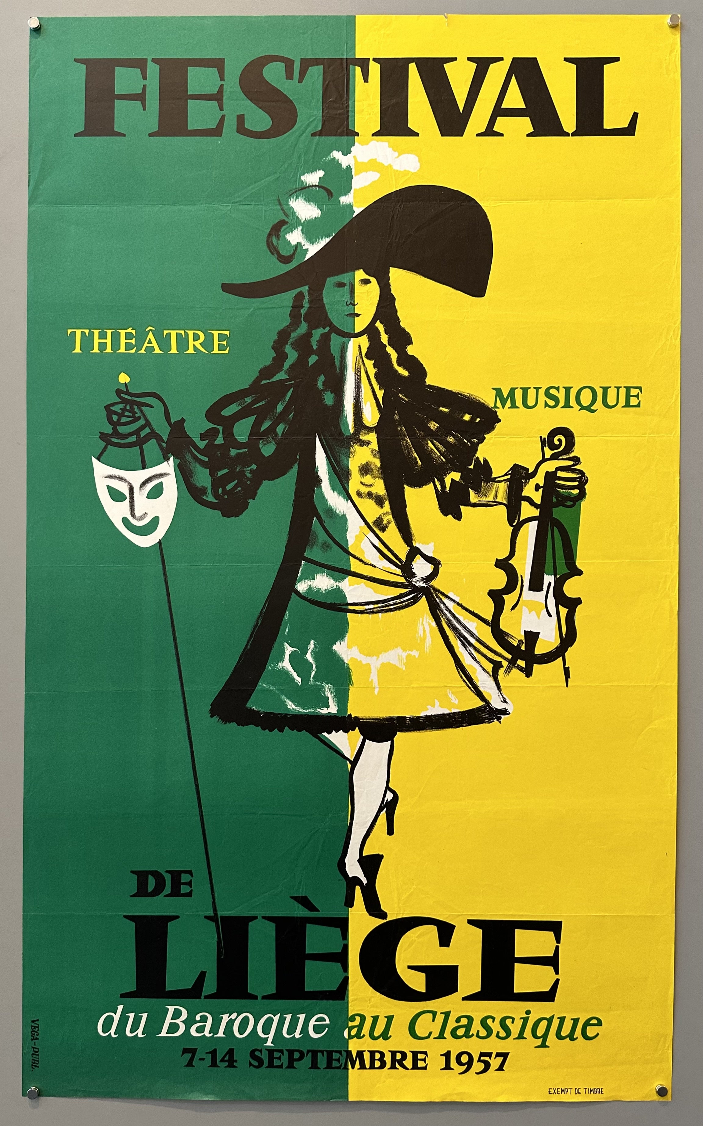 Green and yellow split poster promoting a music and theatre festival in Liege, Belgium.