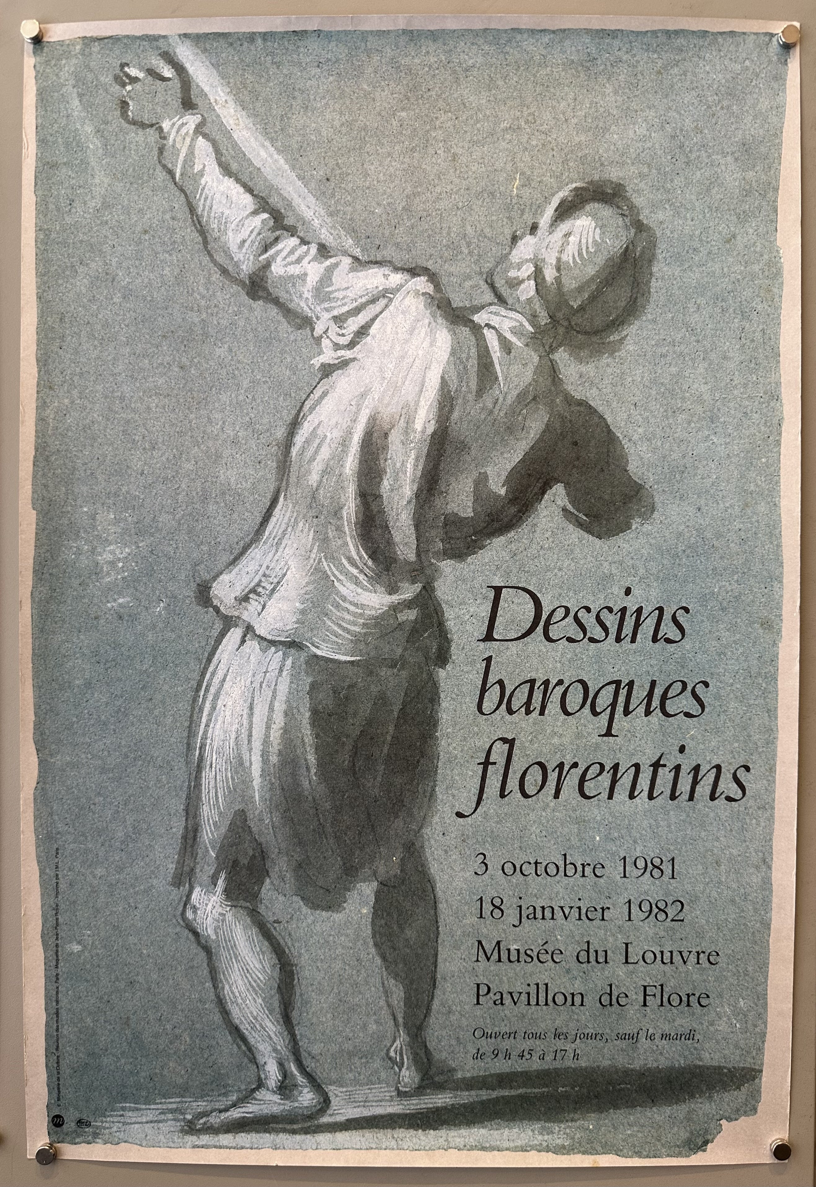 Grey shaded poster with illustration of a man pointing upwards to promote exhibition at the Louvre.