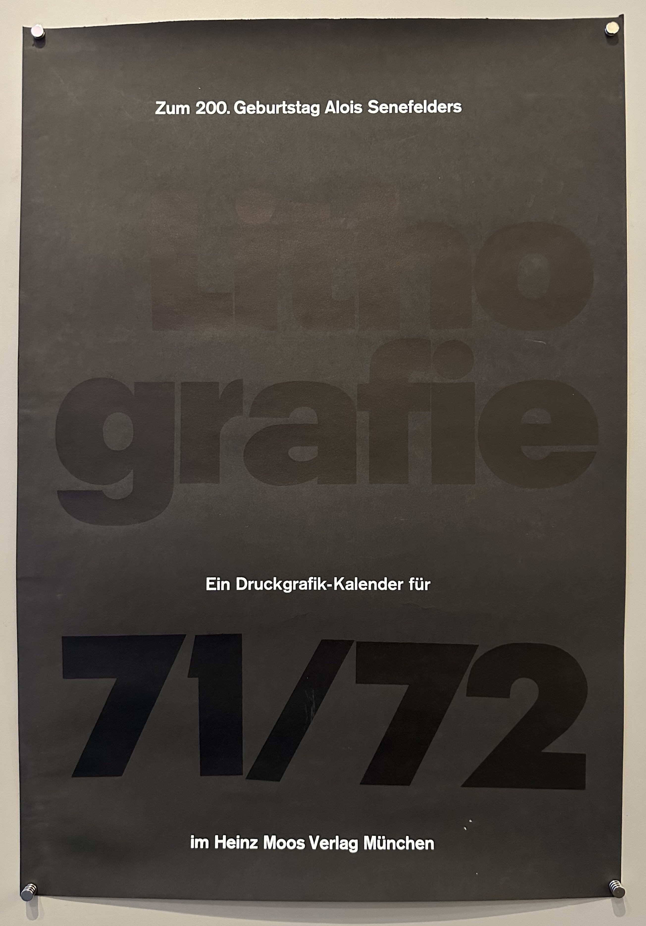 Completely black matte poster with contrasting black and white text for Alois Senefelder's birthday.