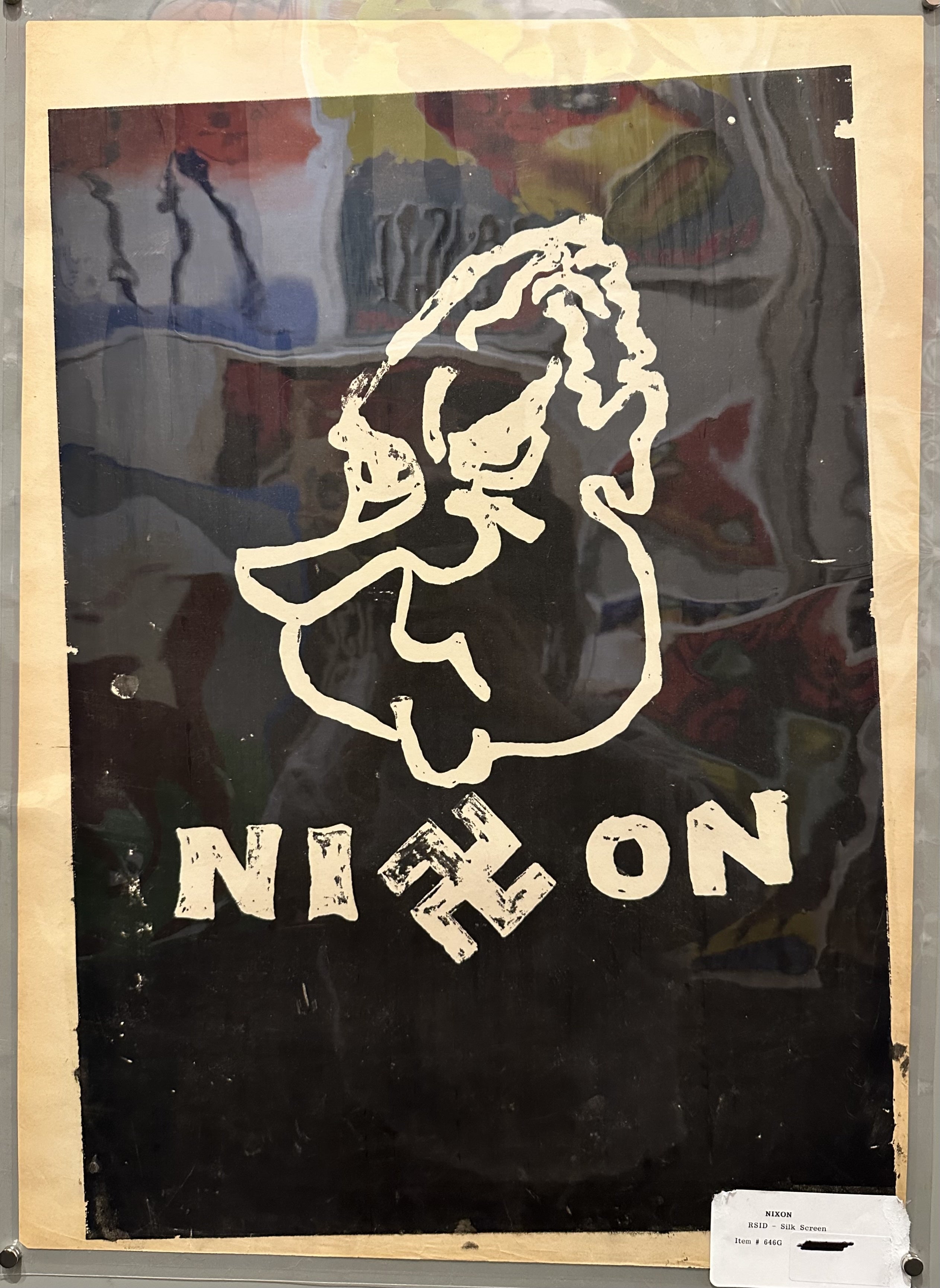 Satirical image of Nixon with a misspelling of his name with a swastika in it.