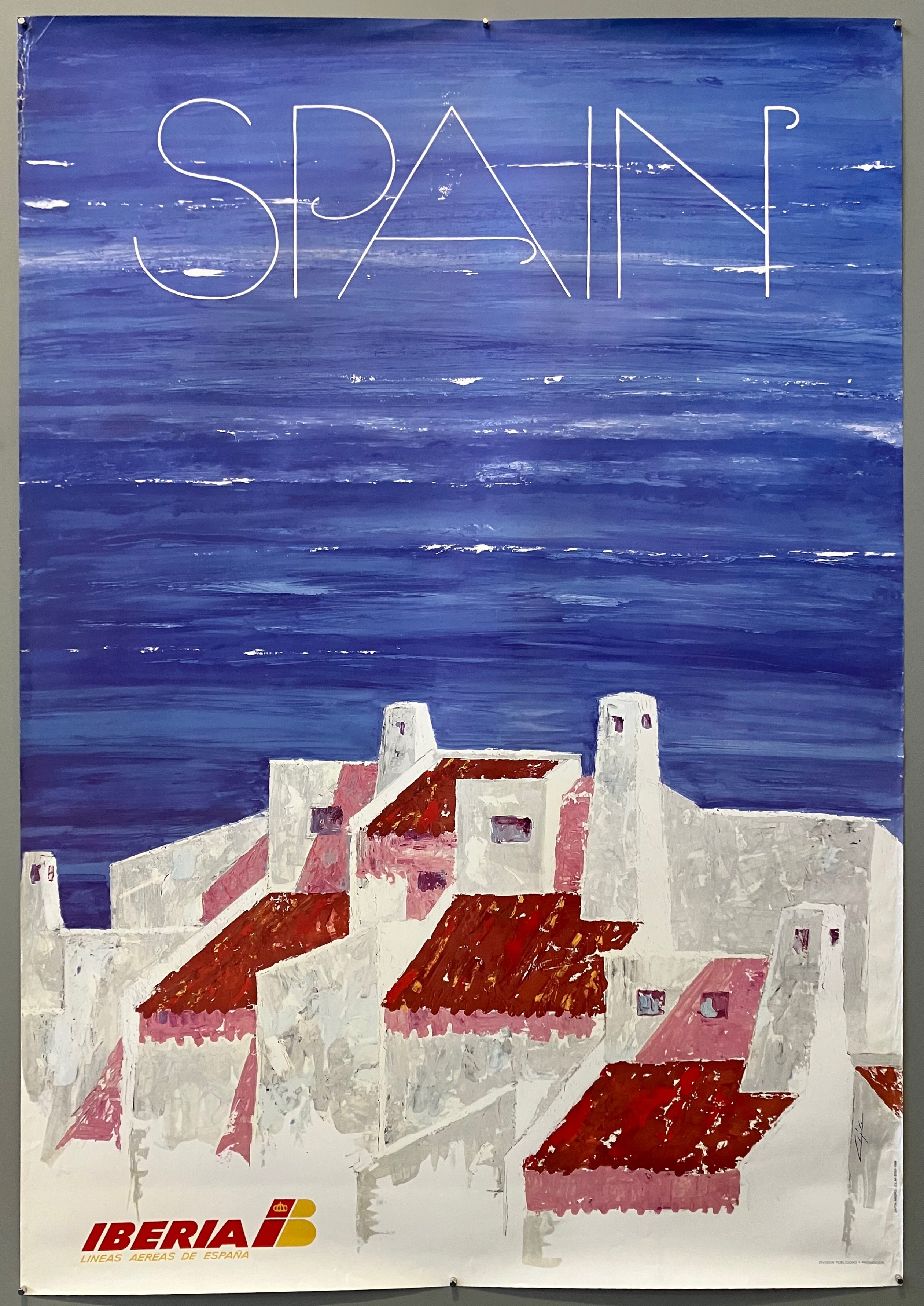 38.5x26.5 iberia airlines poster featuring airline logo and painting of colonial style spanish houses overlooking ocean