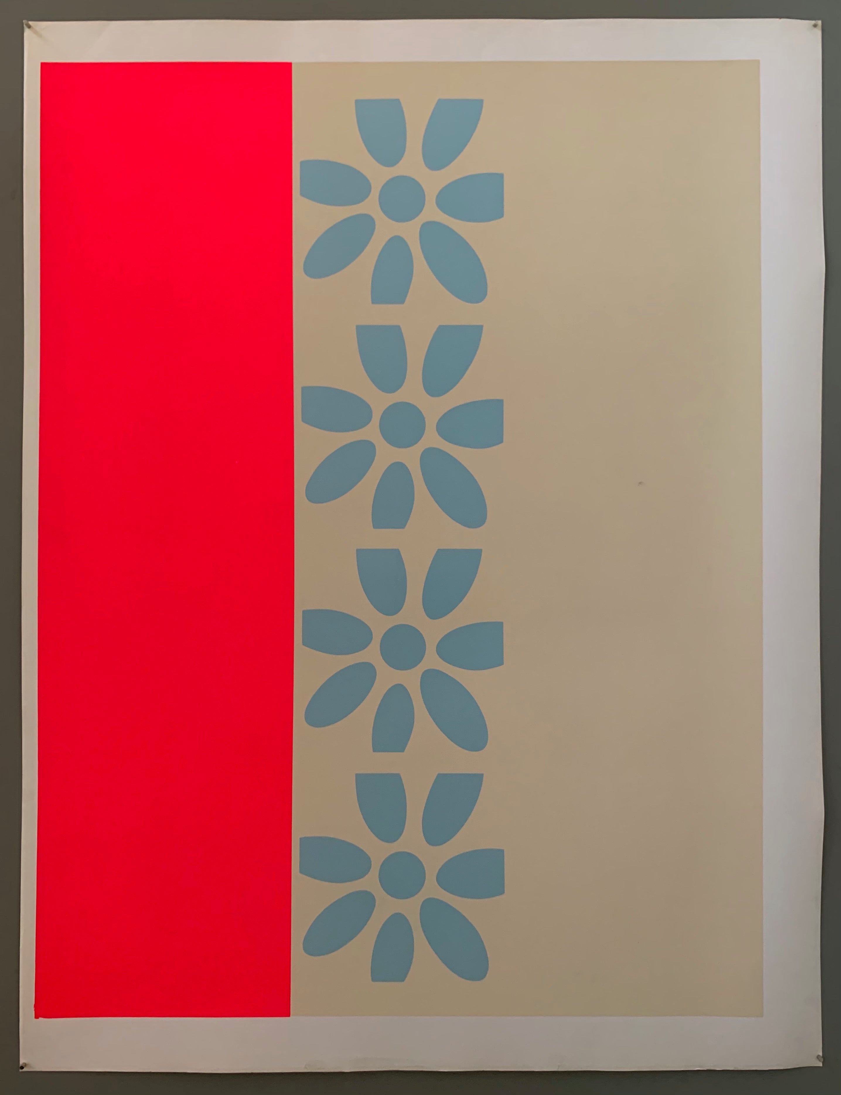 blue prints of his famous flower motif surrounded by tan and neon pink panels.