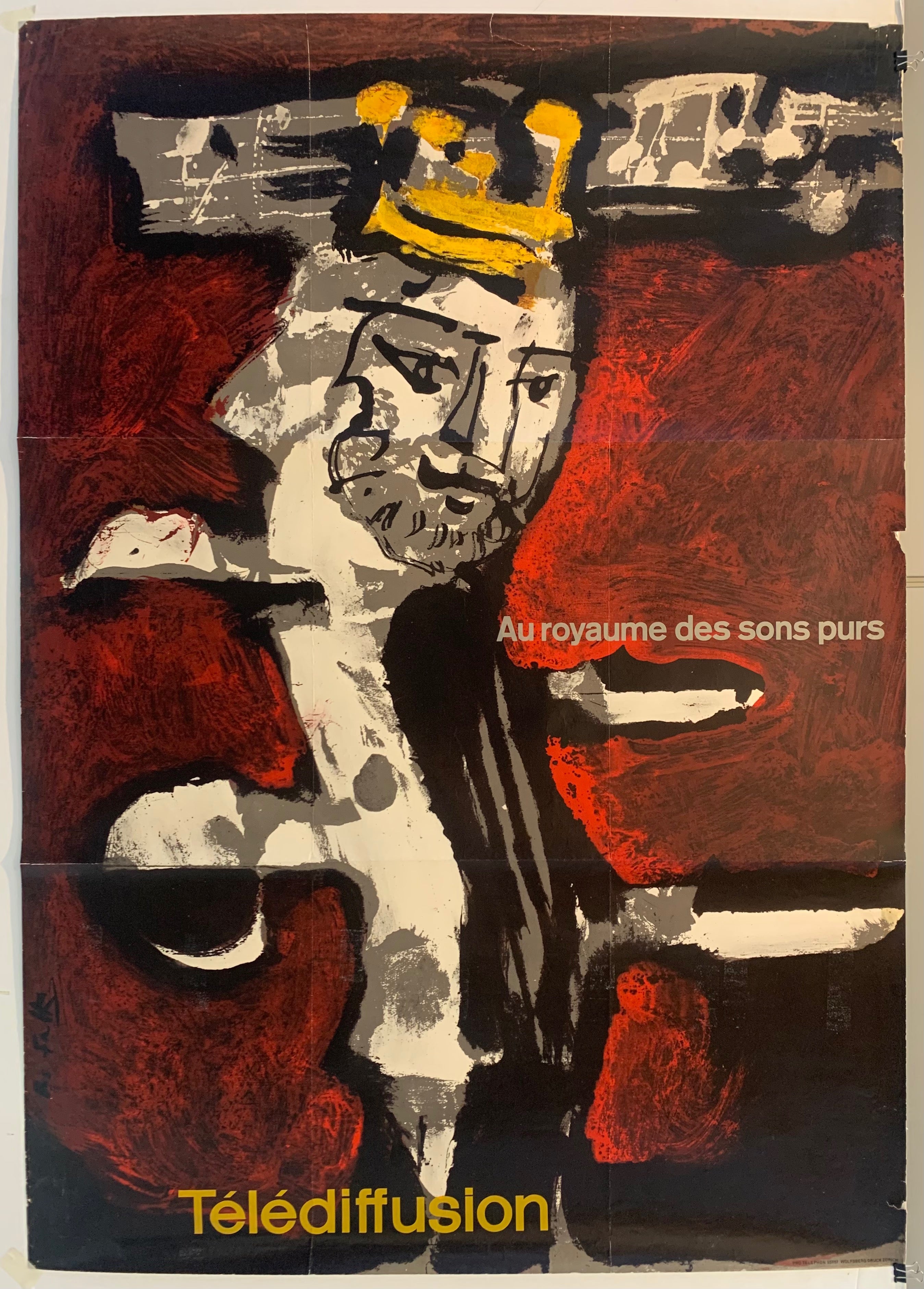 the top of a bass with a head crowned and music notes floating gold crown against a   red background