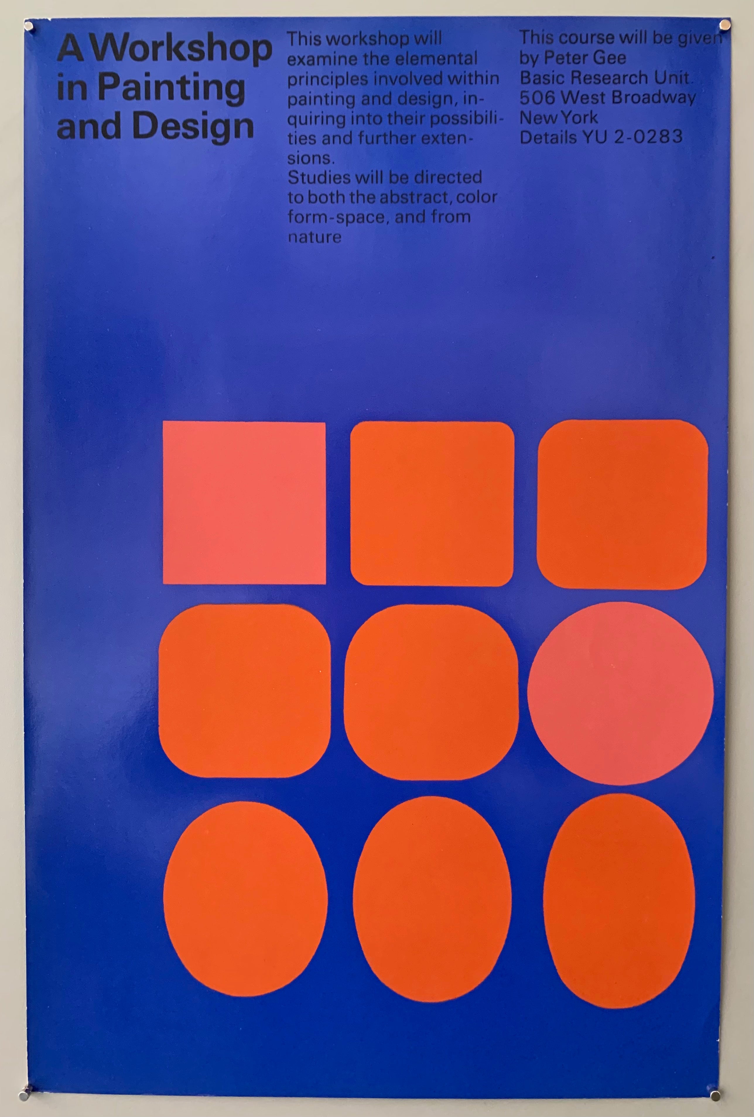 Blue poster with orange squares and ovals
