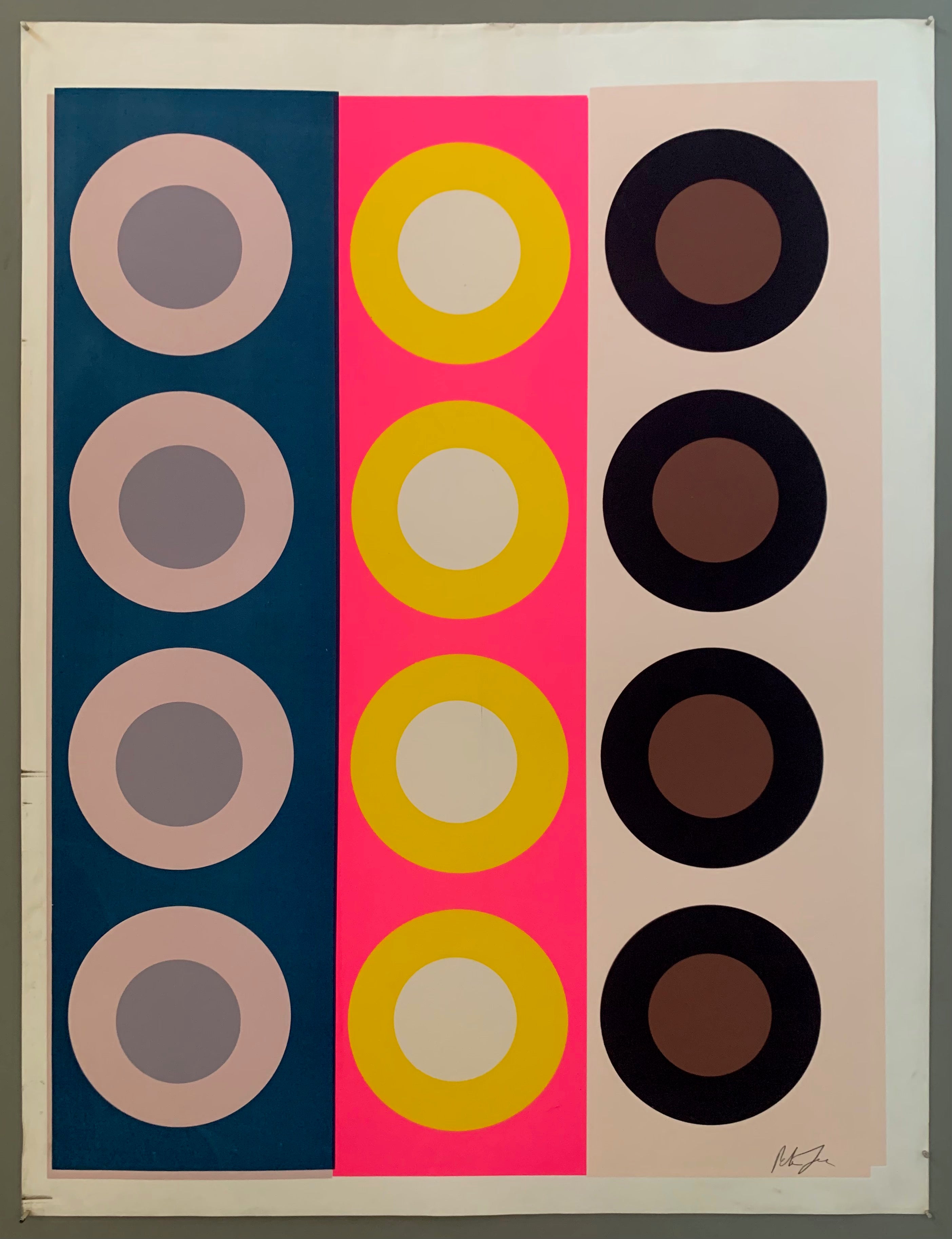 Three panels of targets, on blue and the other two pink.