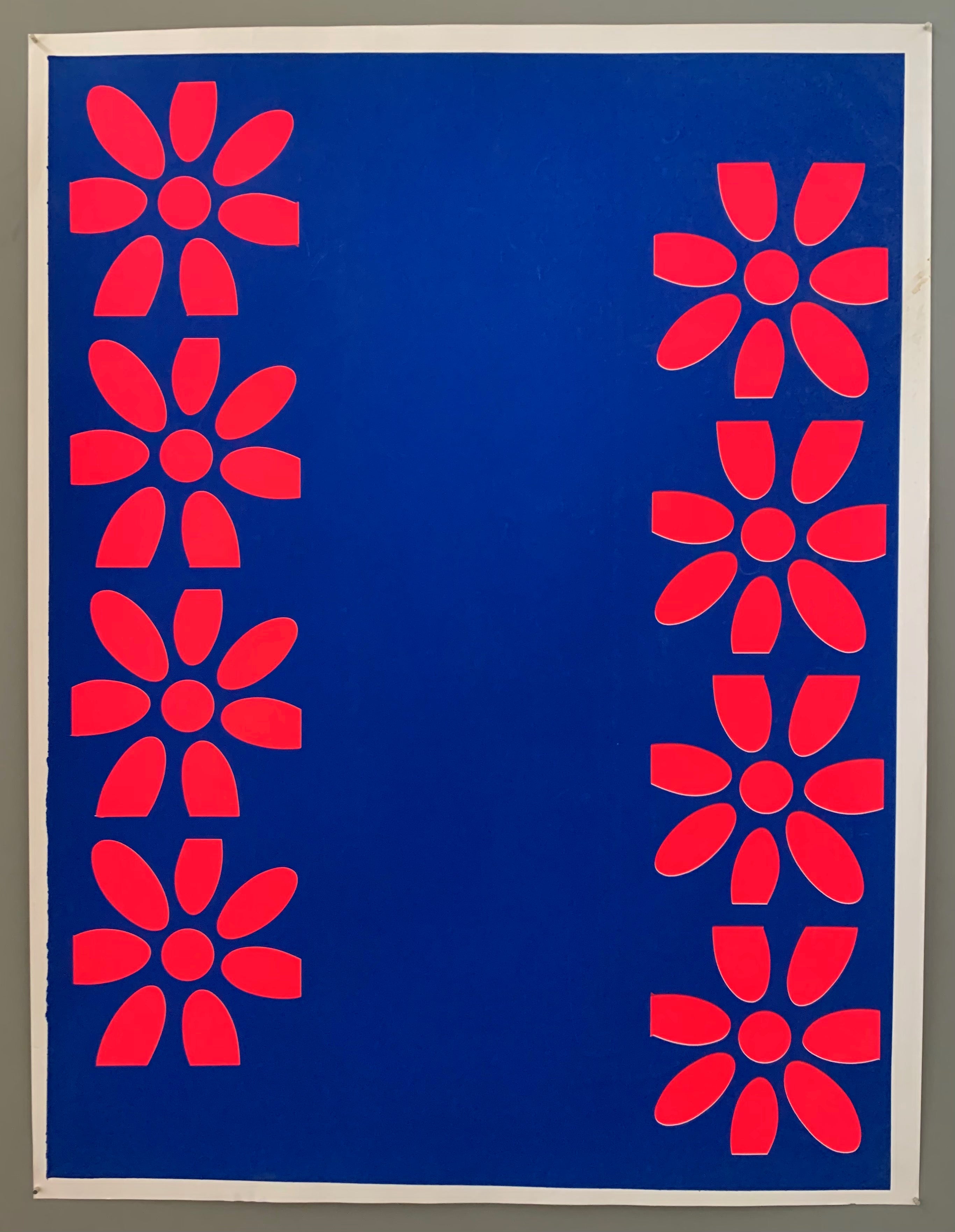 Two rows of pink flowers on a blue background