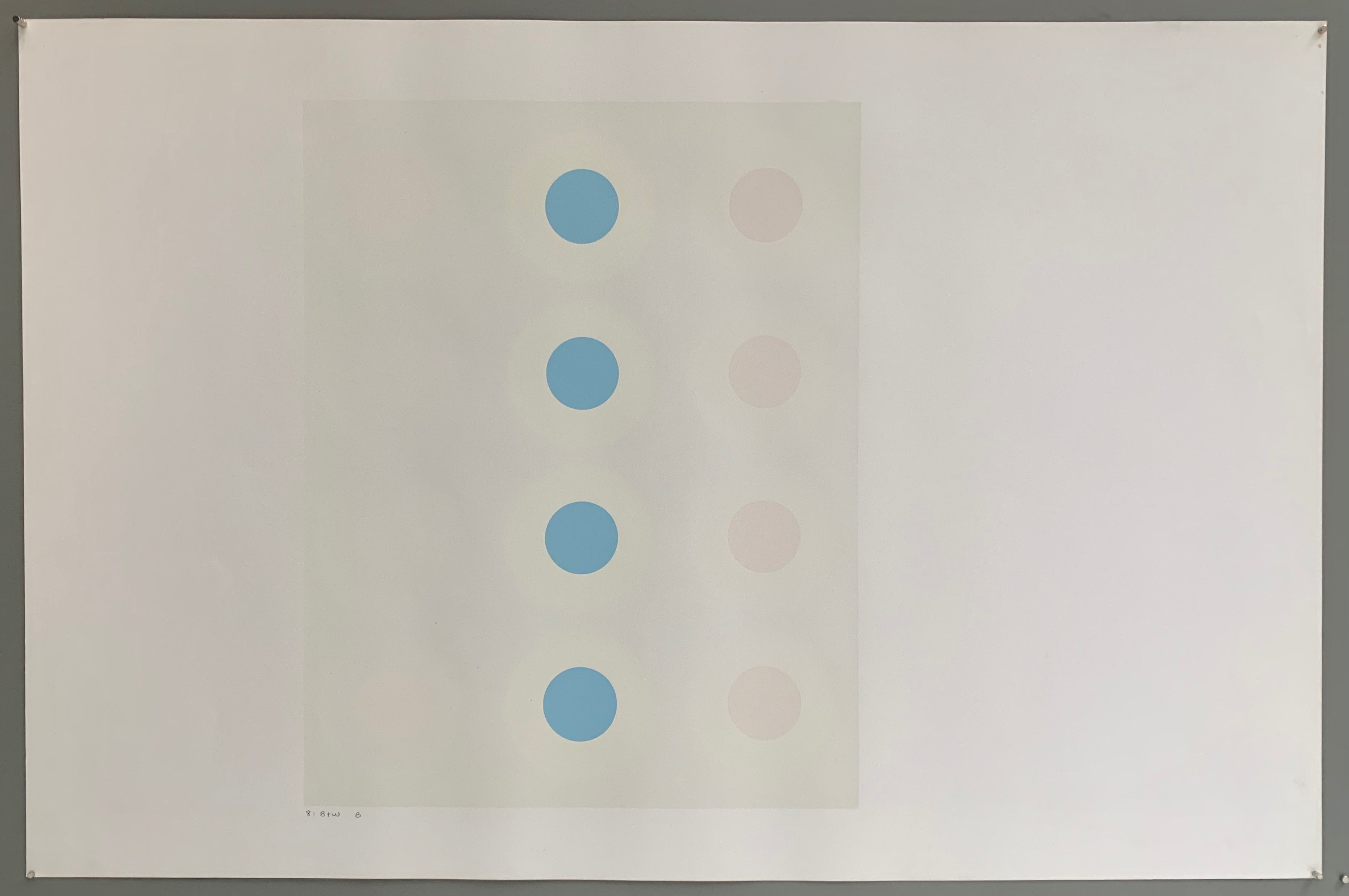 A rectangle made by three panels each holding a line of targets. The colors of this are quite nautical—light grey, white, cream, and a baby blue.