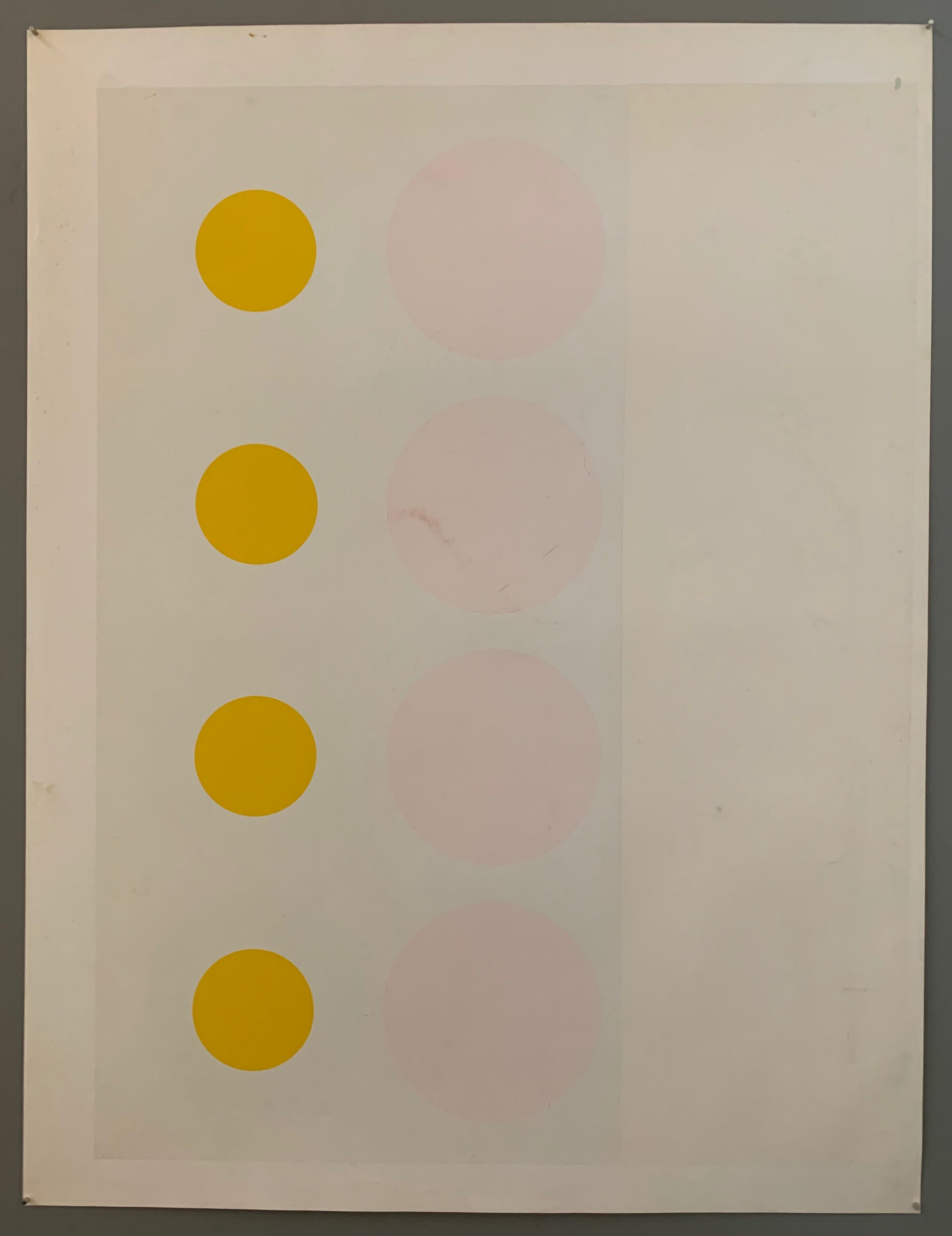 three panels: on the left, a light grey panel with sunny yellow targets. In the middle, a grey panel with blush pink targets.