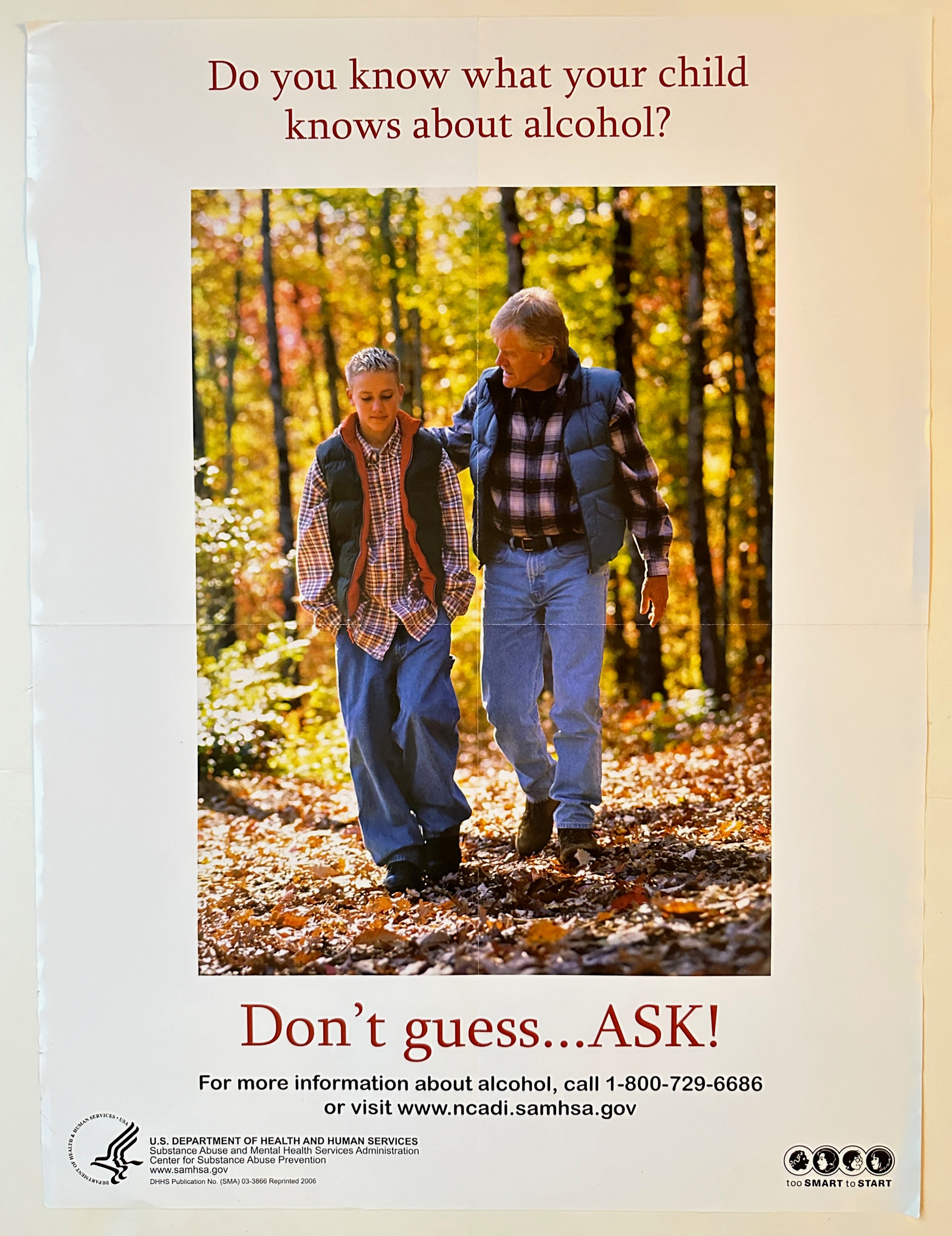 18x24 poster with photograph of father and son awlking through the forest on an autumn day