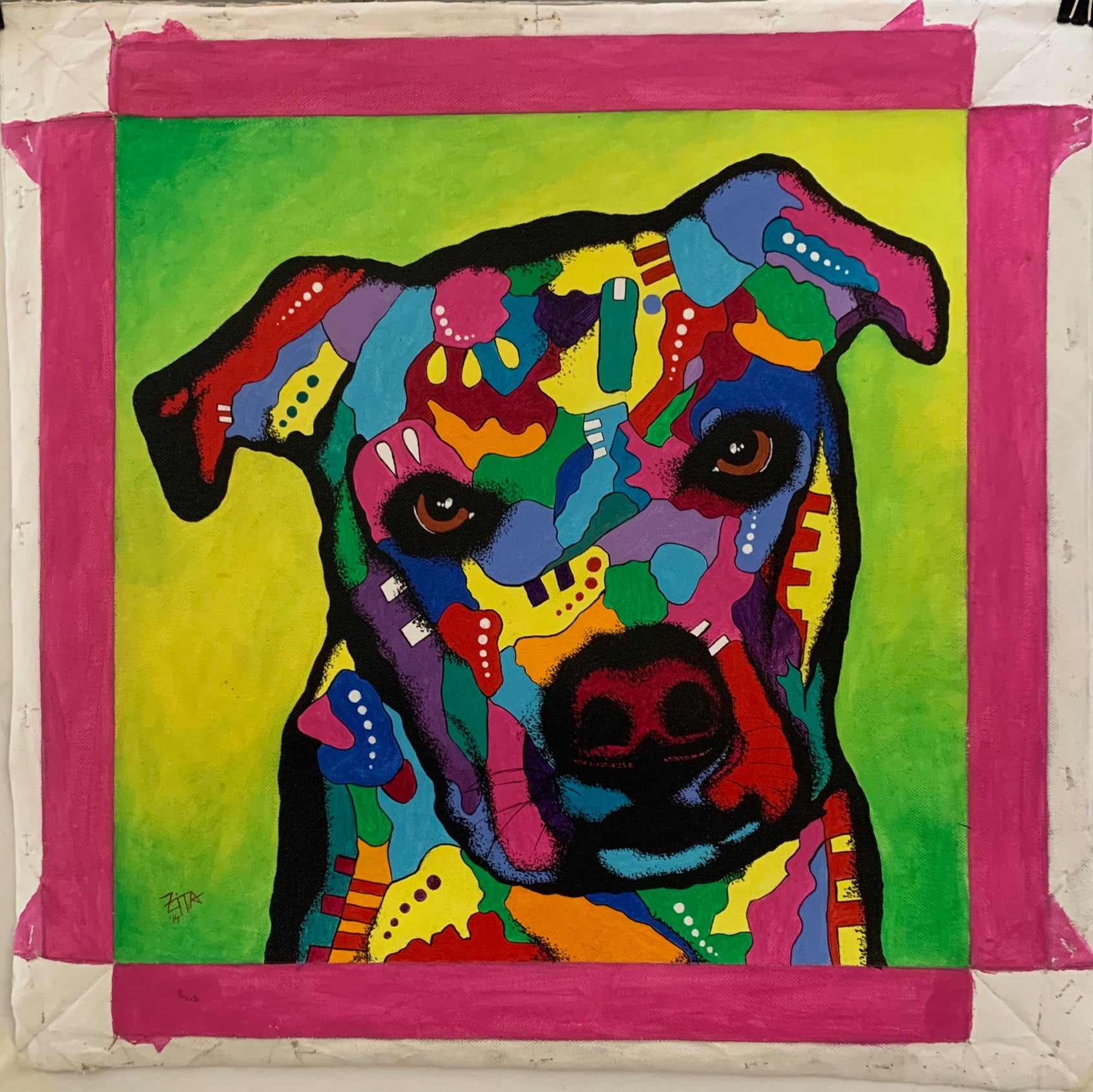 Painting of a multi-colored dog head