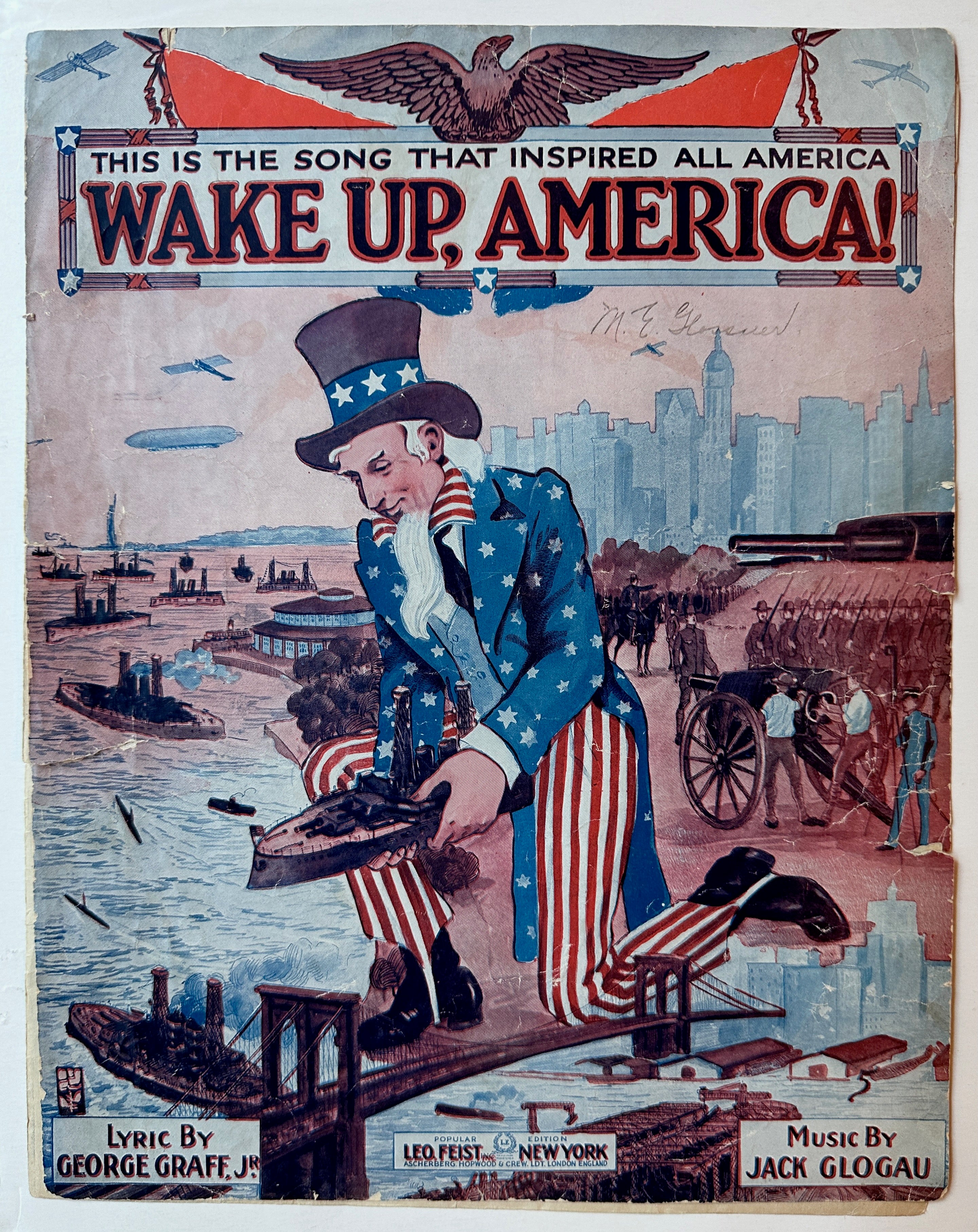 14x11 1916 sheet music booklet for "wake up, america!" including cover featuring red-white-blue illustration of uncle sam with us military and nyc views, sheet music, and back cover advertising other music folios